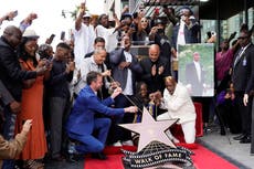 Moment Tupac’s Hollywood Walk of Fame star revealed as rapper posthumously honoured