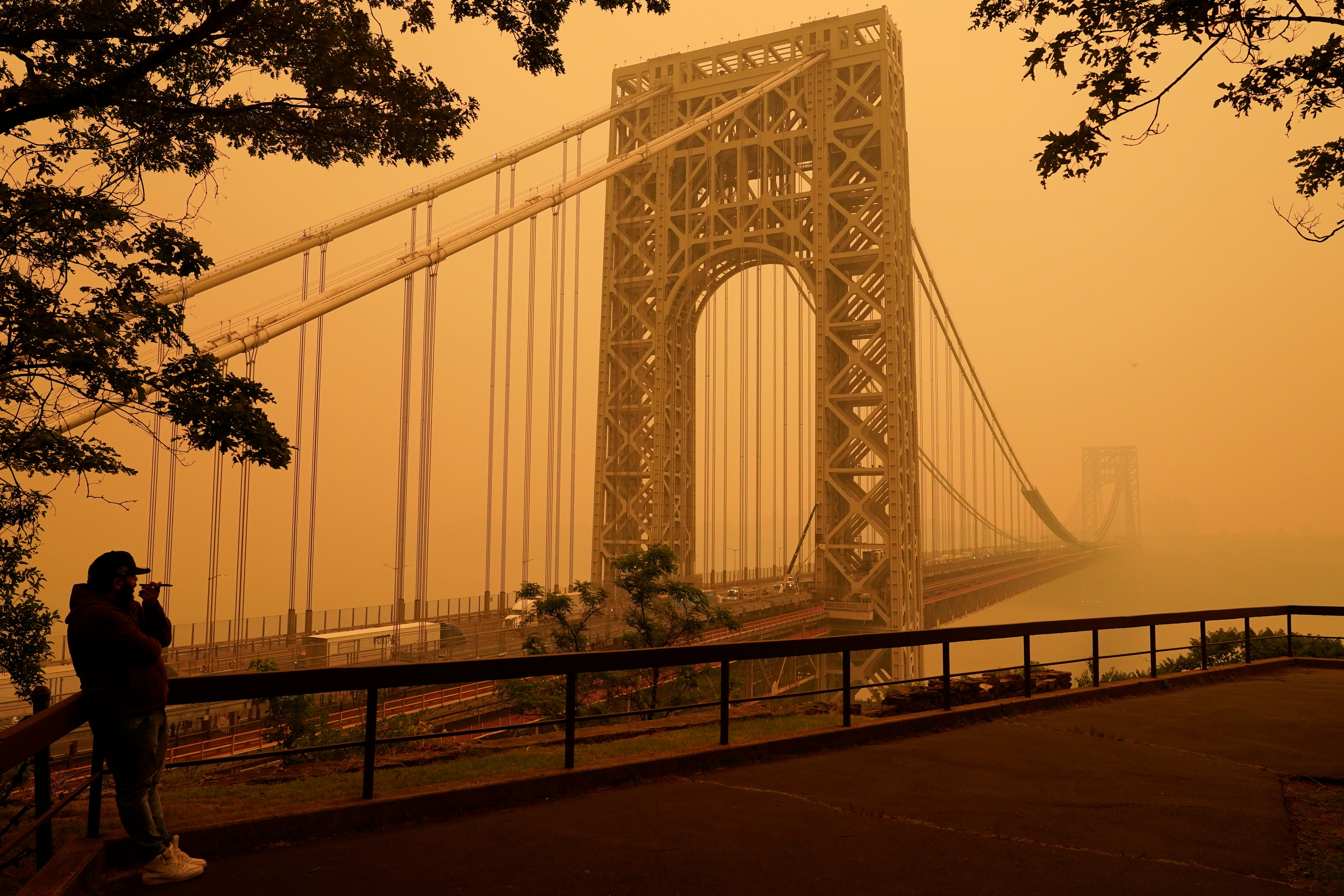 Watch: New York City bridge obscured by eerie haze from Canada wildfires