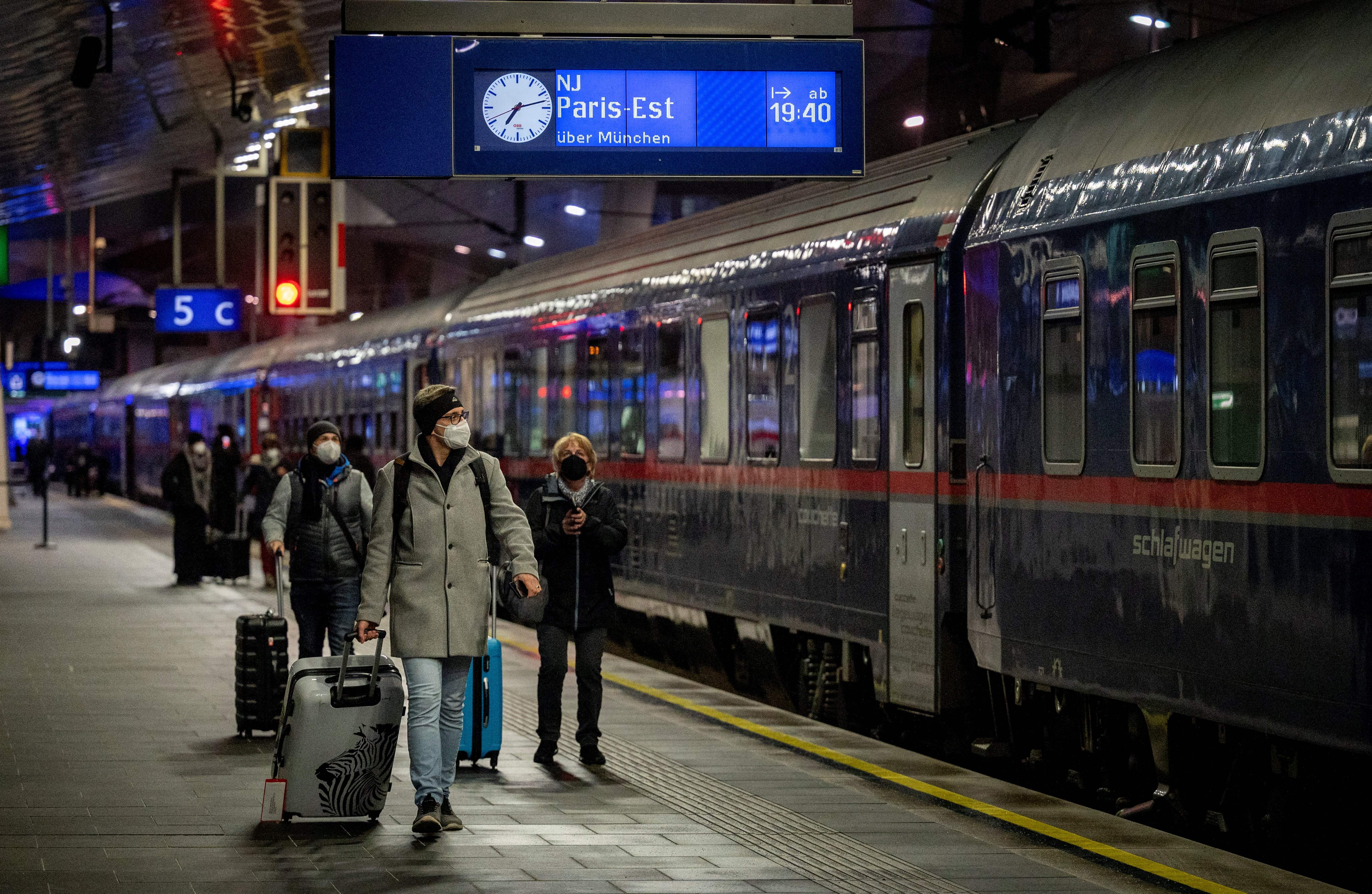 Sleeper trains are undergoing a resurgence on the continent. In this photo from December 2021, passengers board the first new Nightjet service from Vienna to Paris via Munich