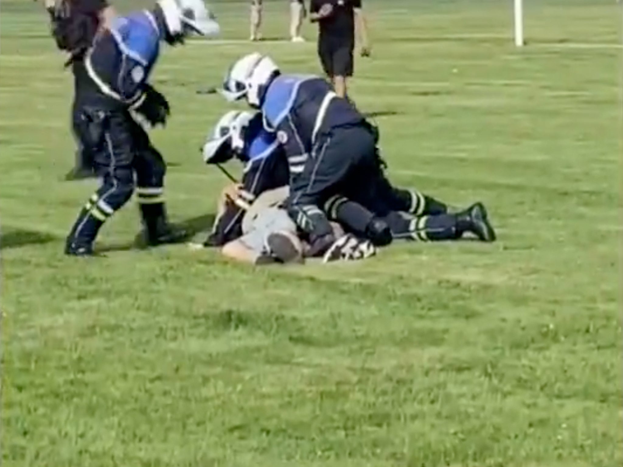 French police tackle the man to the ground after the stabbings