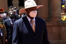 Uganda's long-time president says he's taking 'forced leave' after testing positive for COVID-19