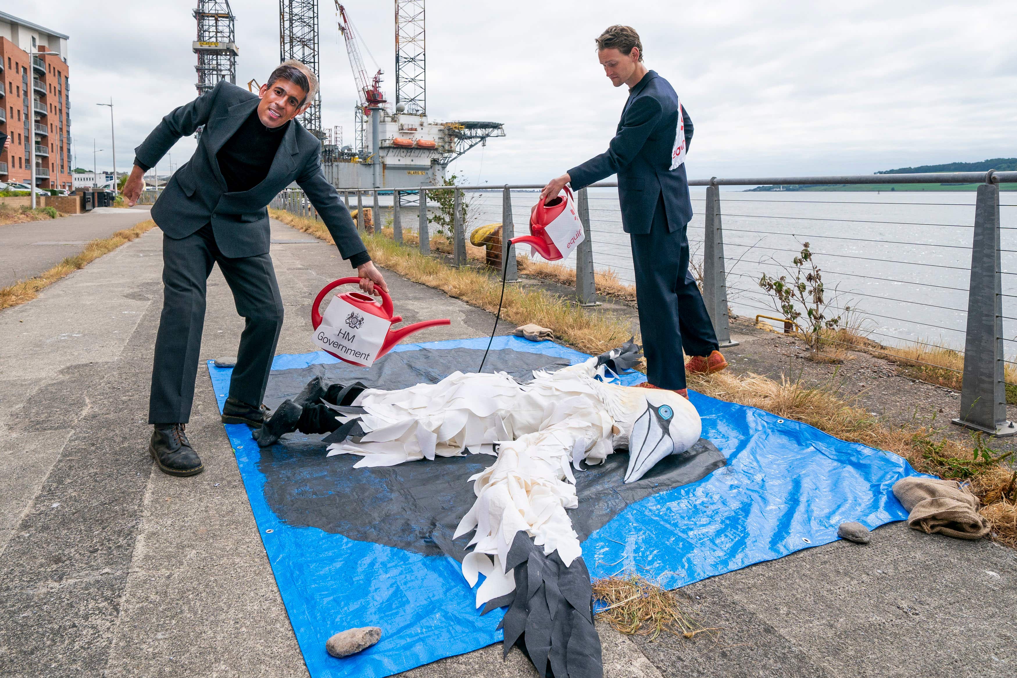 Members of Ocean Rebellion take part in a protest opposing the Rosebank oil field (Jane Barlow/PA)