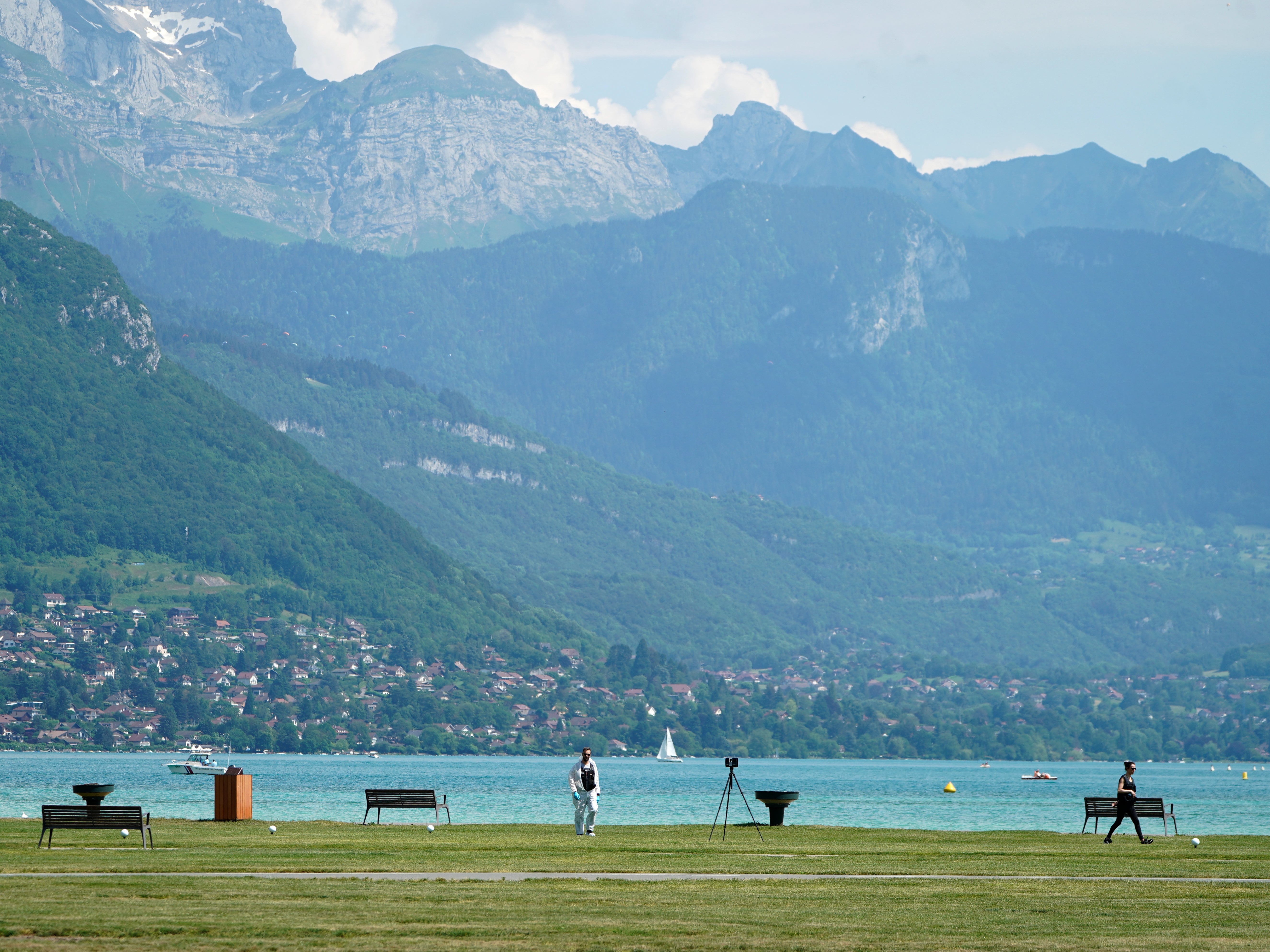 Forensics officers at the scene in Annecy