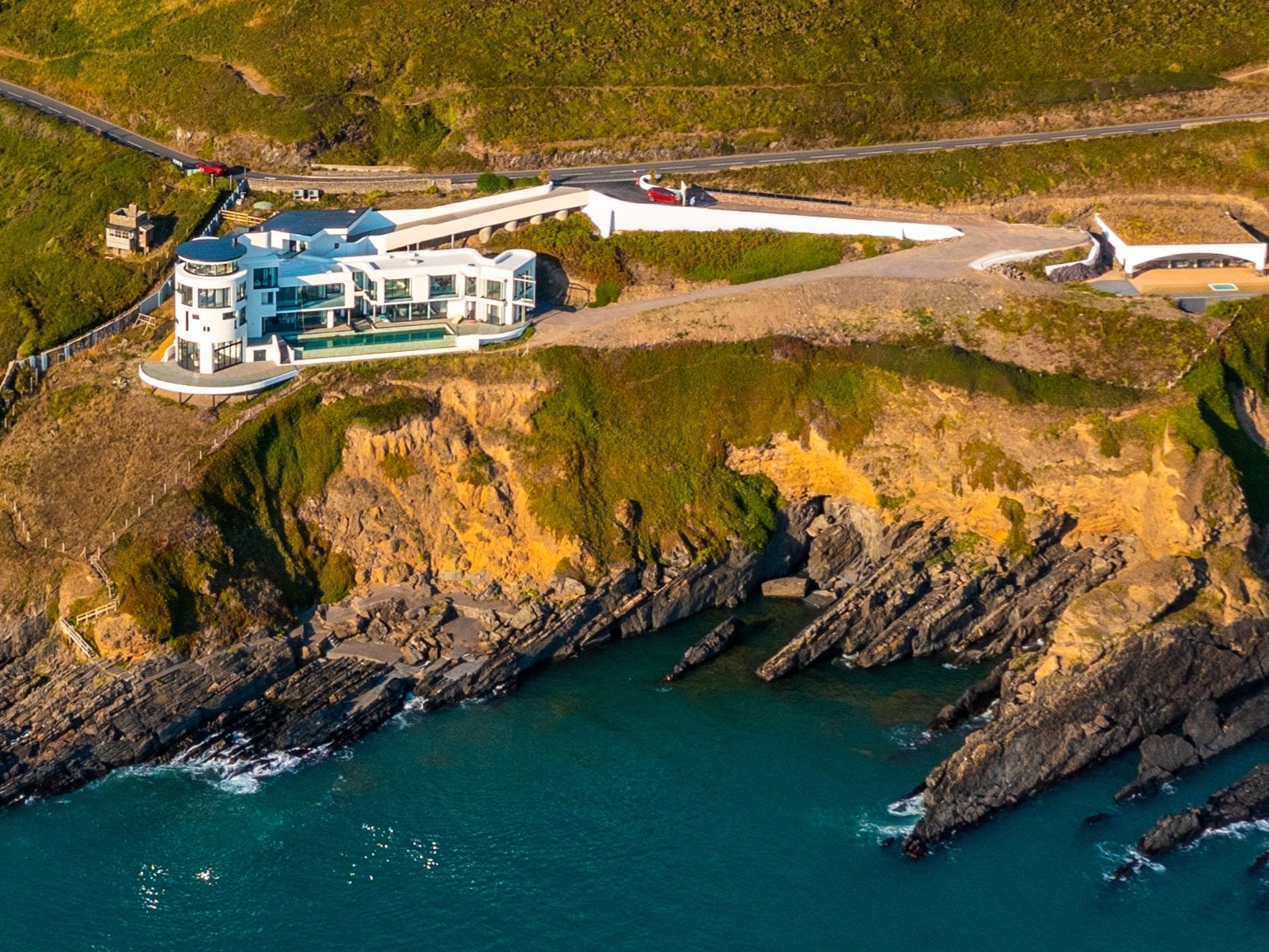 The house is pile-driven to save it from falling into the sea when the cliffs erode