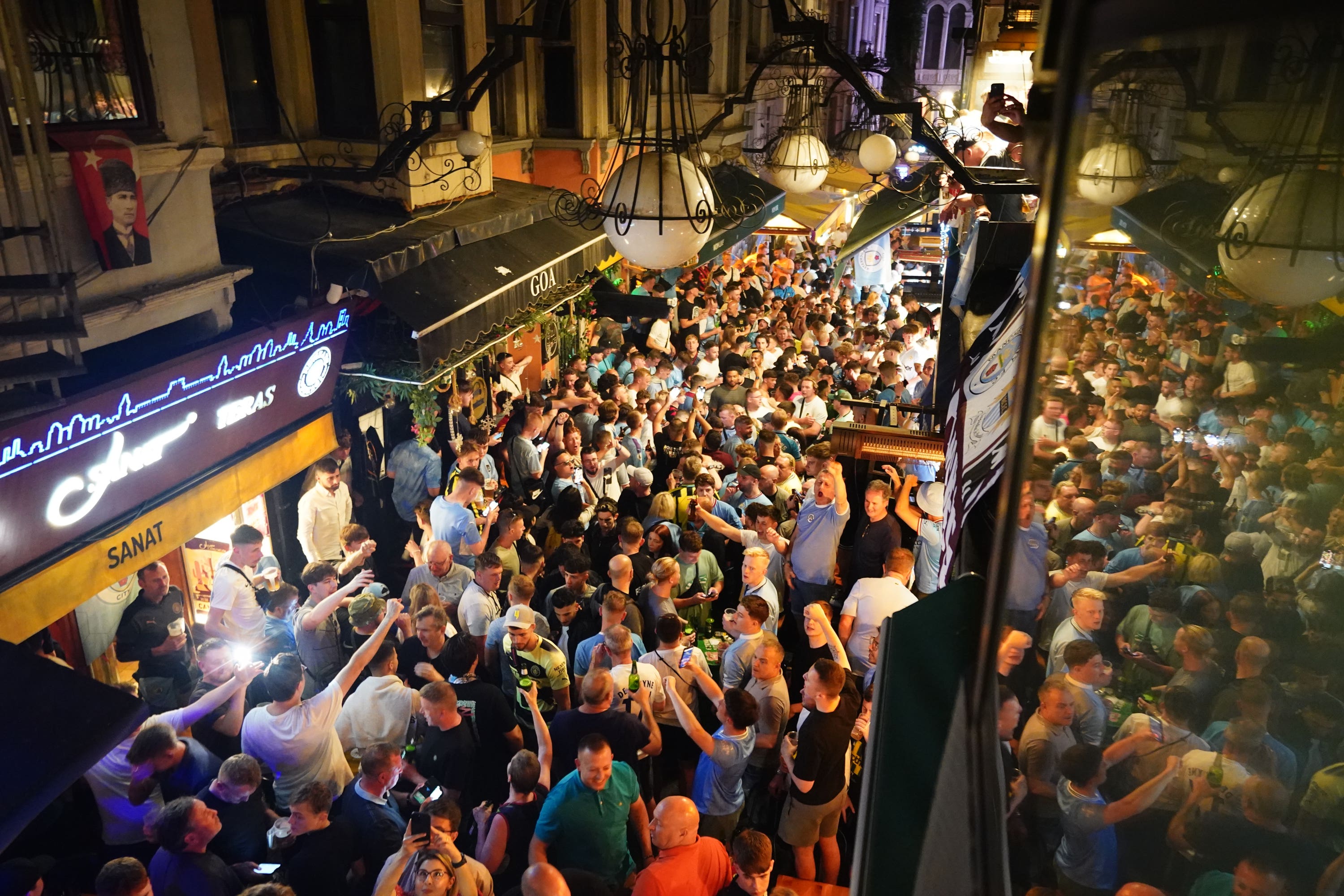 Football fans in central Istanbul (James Manning/PA)