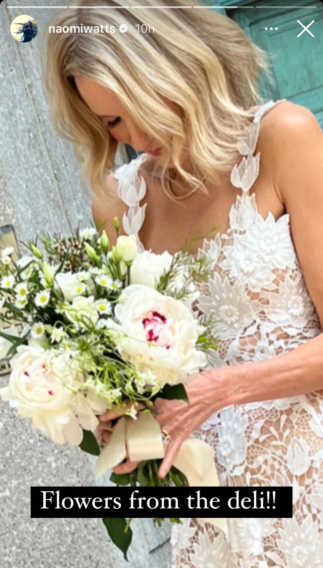 Naomi Watts wore an Oscar de la Renta dress for her nuptials, with flowers from a deli in New York