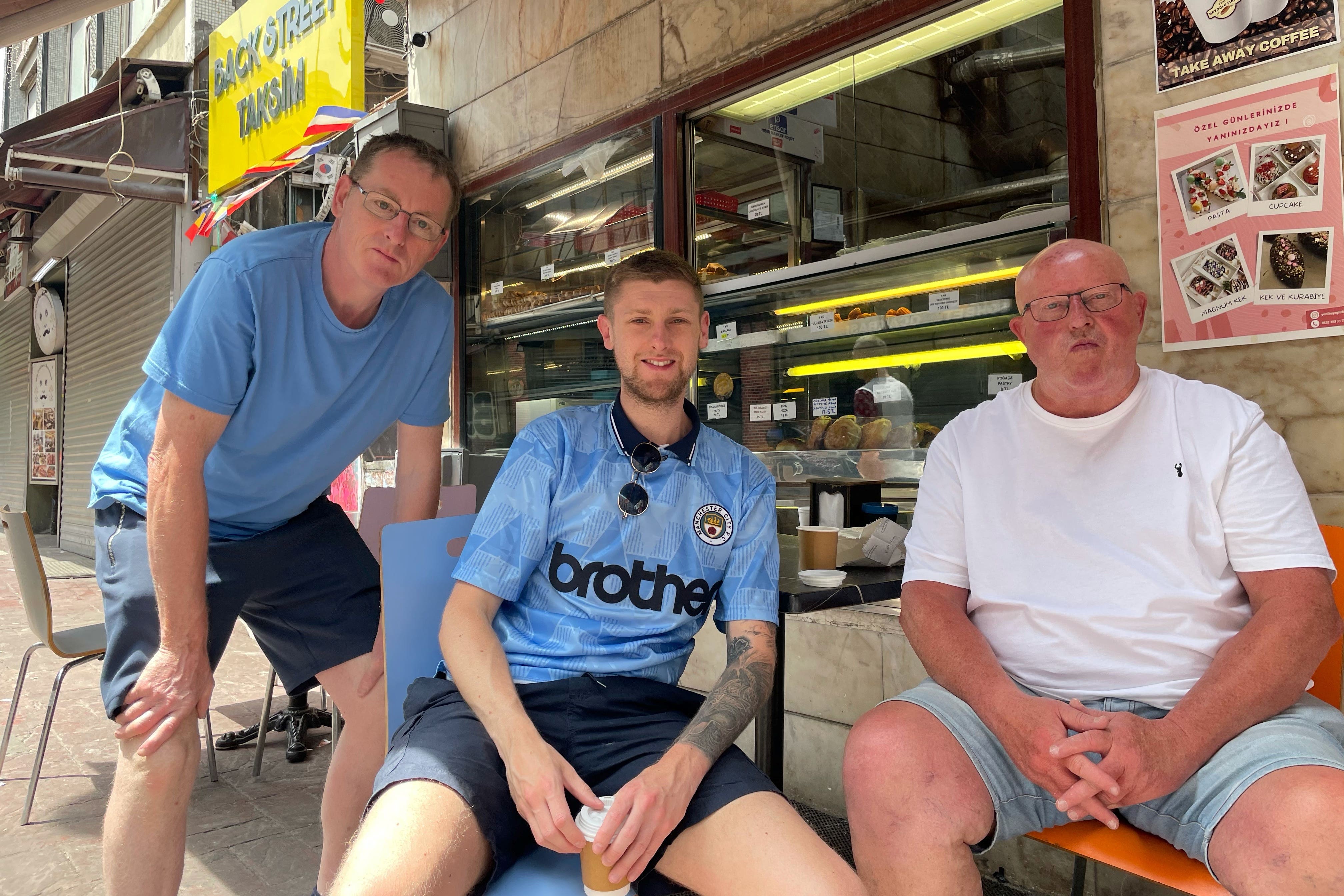 (l to r) Wayne Jeffries, Stephen Woods and Dave Faulkner in central Istanbul (Luke O’Reilly/PA)