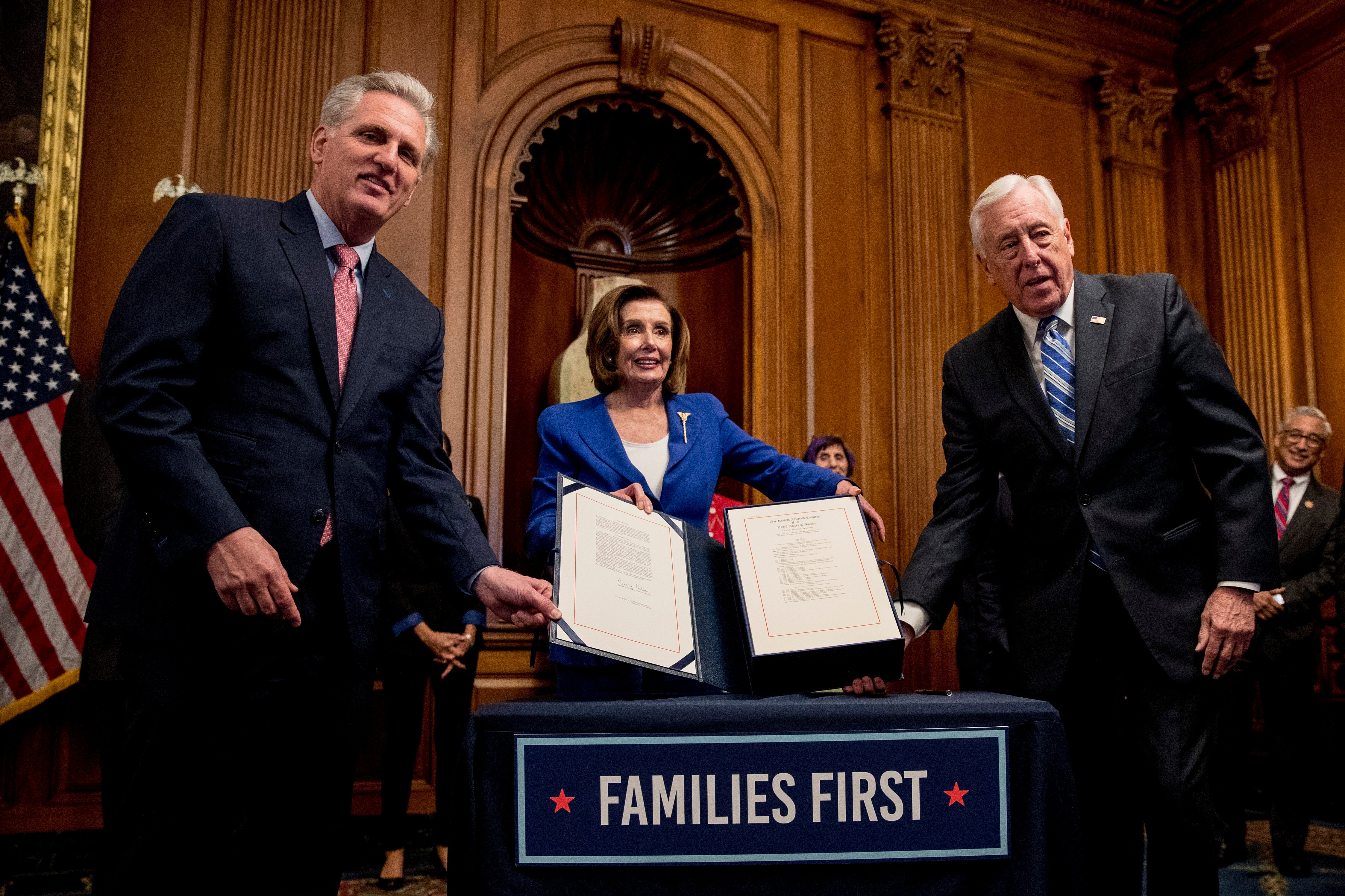 Hoyer (right) and Pelosi (middle) stood down from House Democratic leadership in tandem in 2022