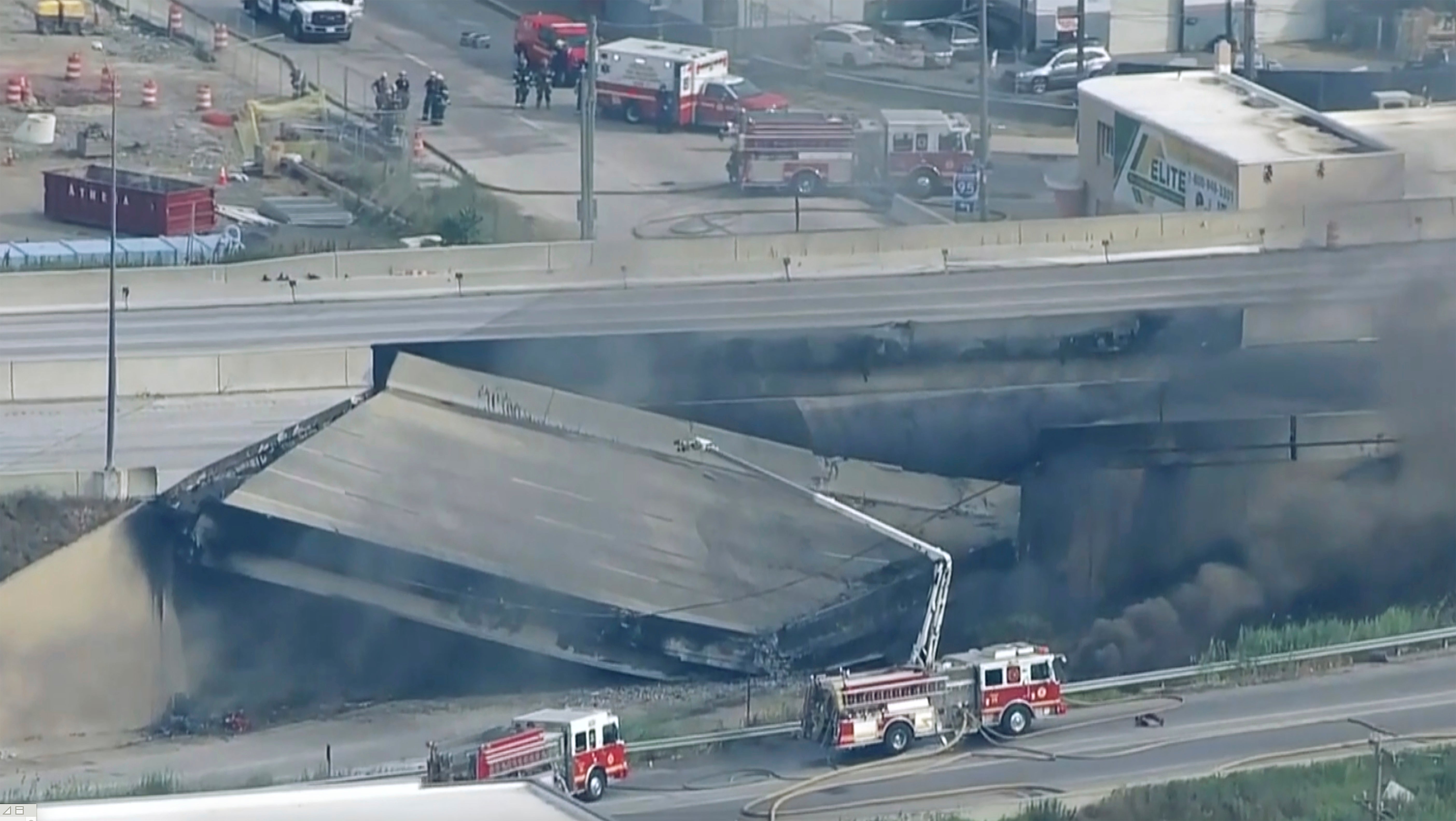 This screen grab from video provided by WPVI-TV/6ABC shows the collapsed section of I-95 with fire trucks on the scene in Philadelphia, Sunday, June 11, 2023. (WPVI-TV/6ABC via AP)