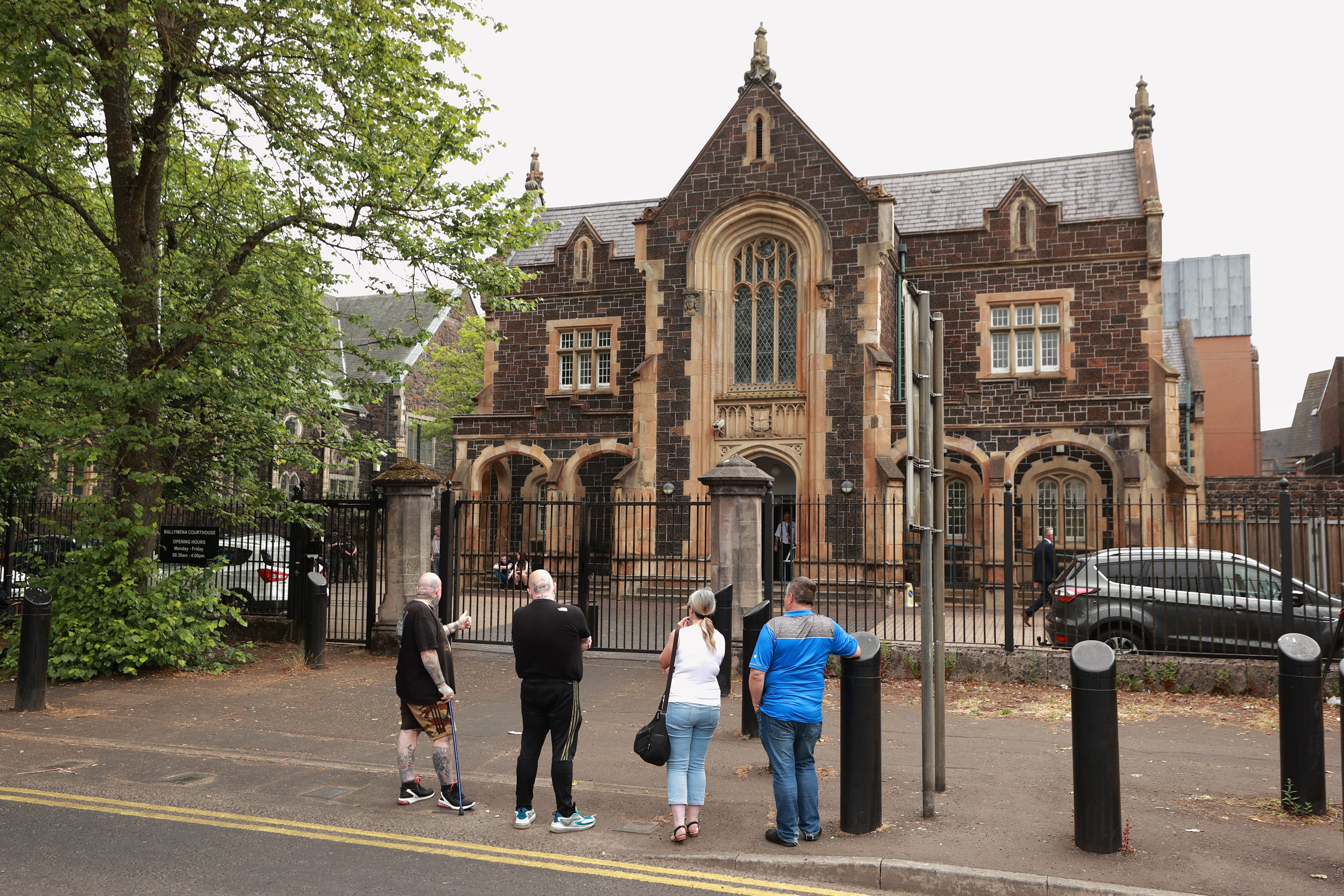 Members of the public outside Ballymena Courthouse in Northern Ireland where Brandon John Rainey, 26, of James Street in Ballymena appeared in court in Co Antrim charged with the murder of 21-year-old Chloe Mitchell, who was last seen in the early hours of Saturday June 3 in Ballymena town centre (Liam McBurney/PA)