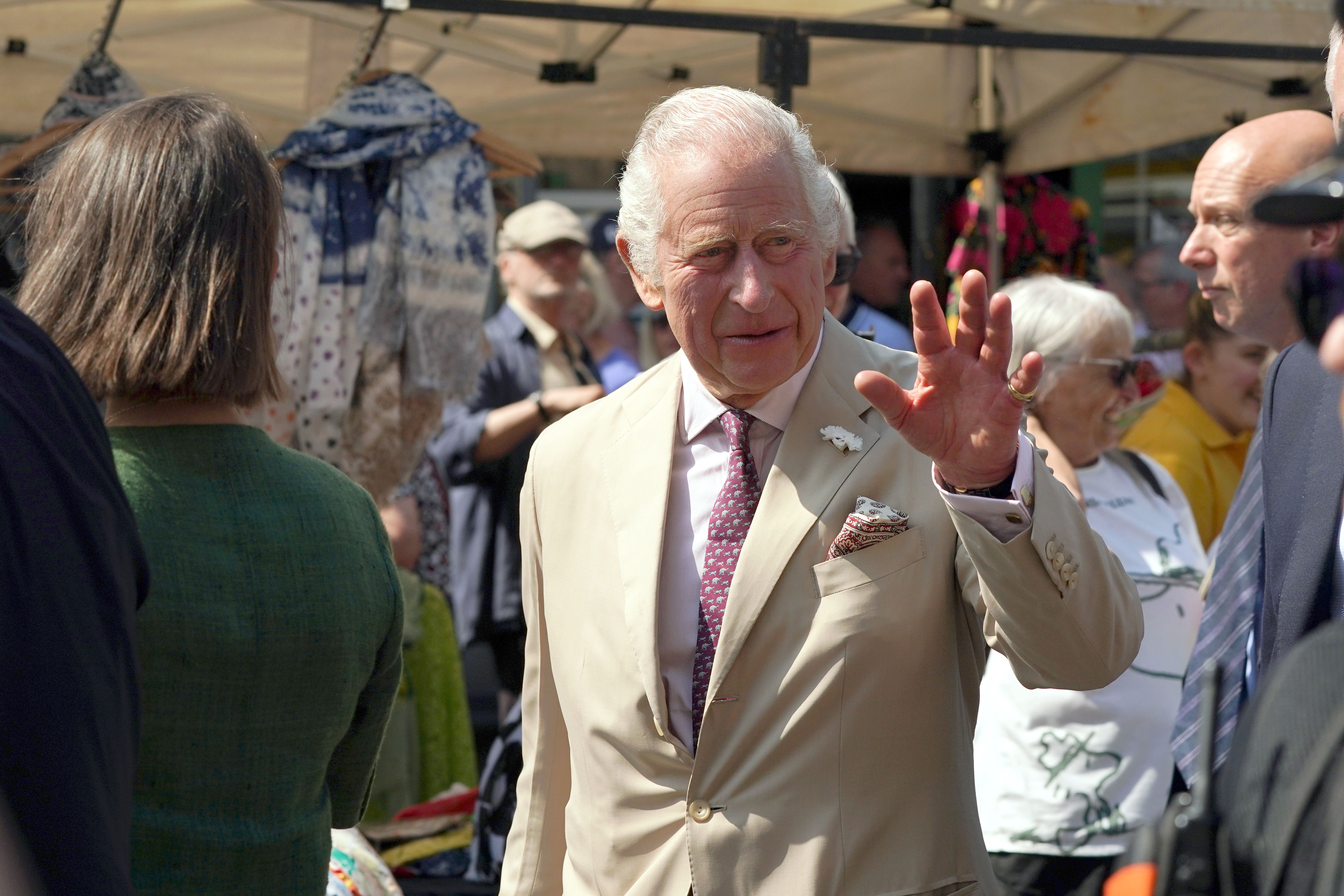 The King went on a walkabout in the market town of Pickering after a trip through the countryside on the North Yorkshire Moors Railway (Owen Humphreys/PA)