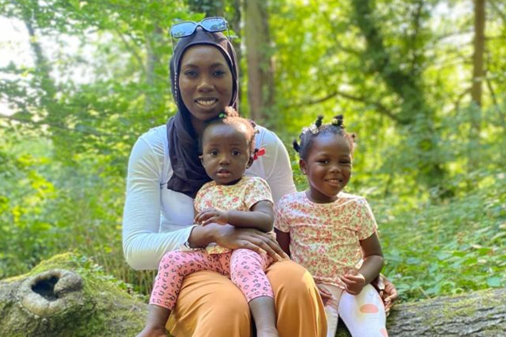 Fatoumatta Hydara with her children Naeemah Drammeh, aged one, and Fatimah Drammeh, aged three (Family handout)