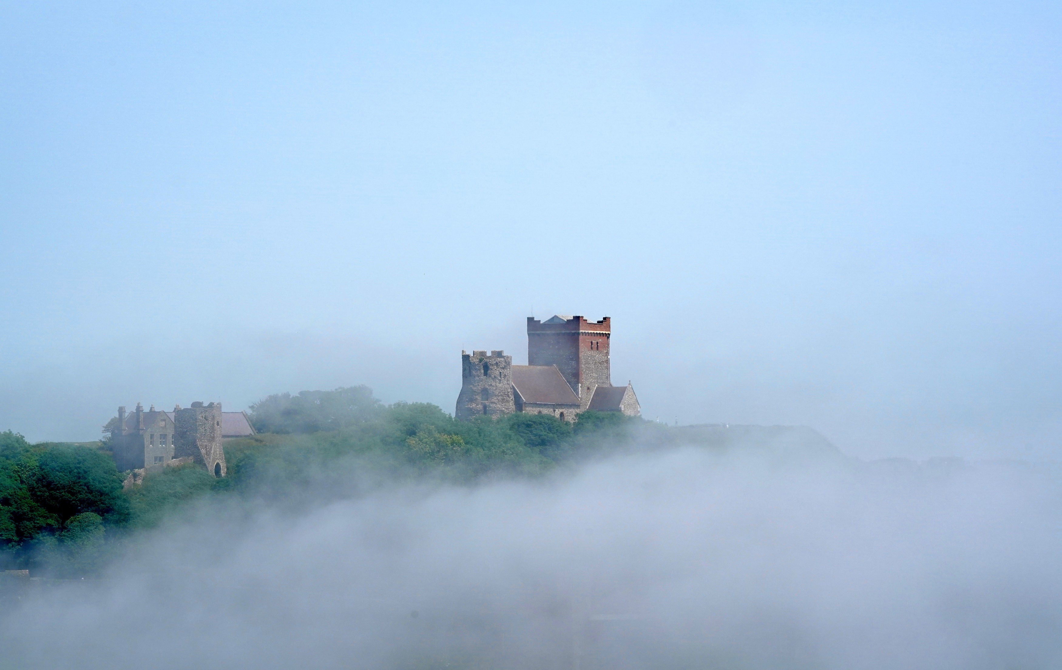 St Mary in Castro church is shrouded in fog upon the White Cliffs in Dover, Kent.