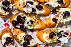 Roasted grape, honey and feta crostinis are perfect dinner party canapes