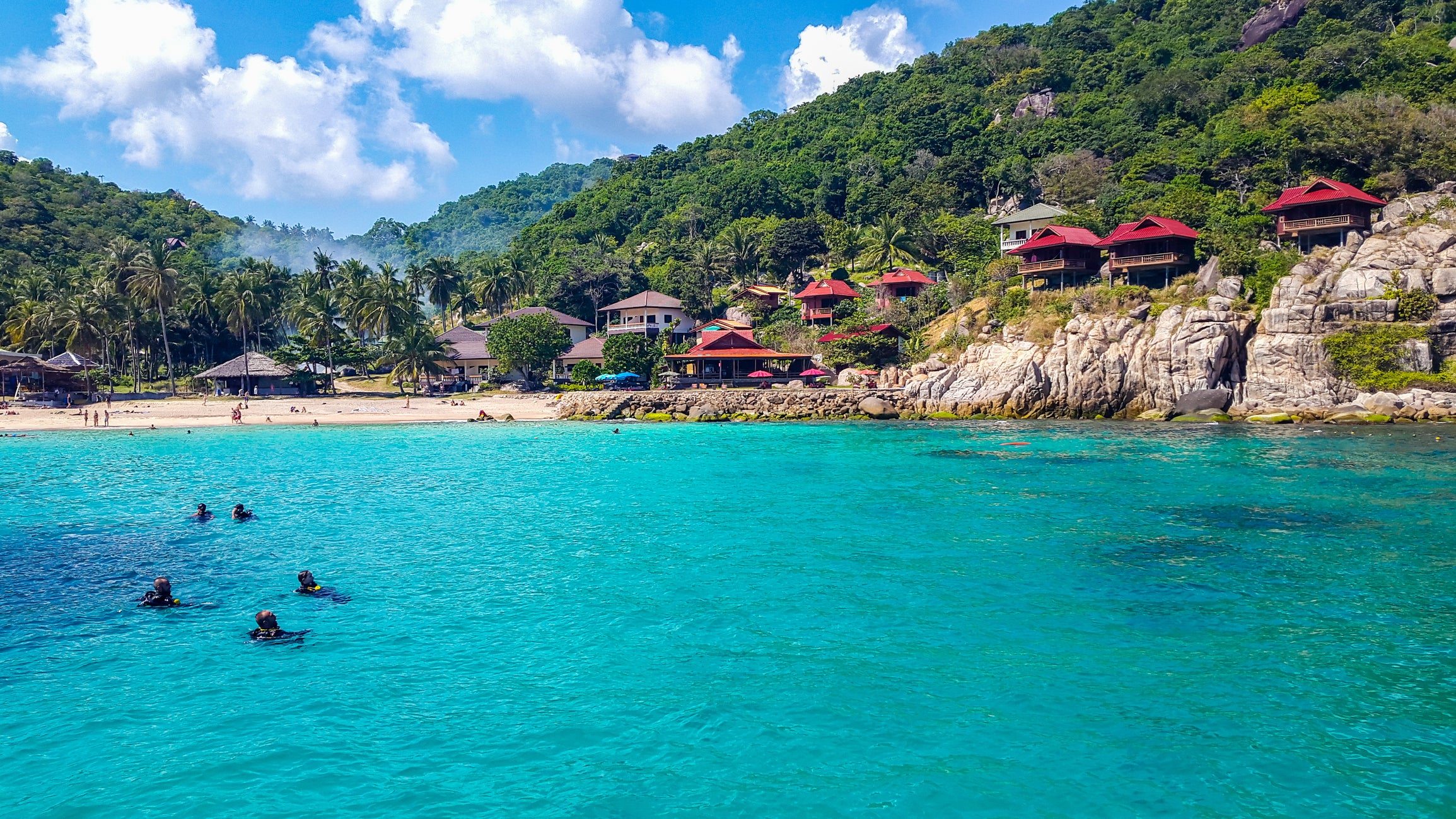 Divers off of Ao Leuk Beach, Koh Tao