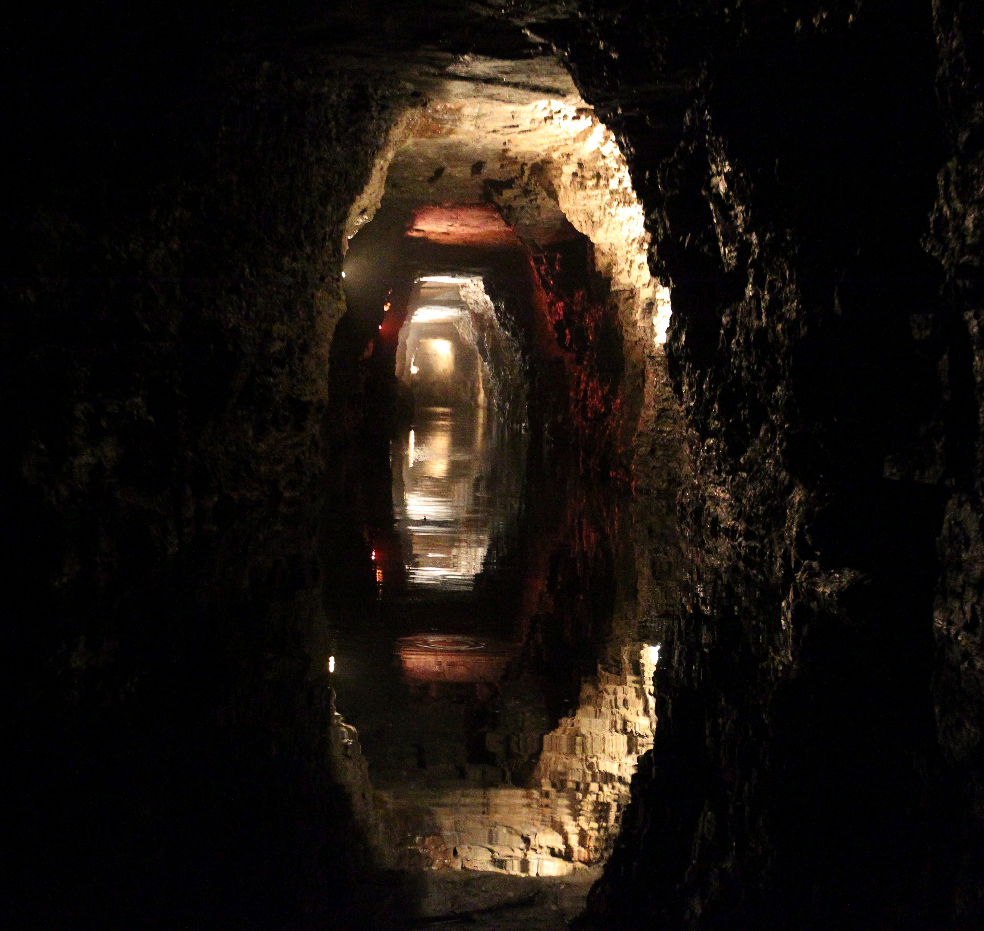 FILE - Water reflects the rock of the man-made Lockport Caves in Lockport, N.Y., on Aug. 21, 2014