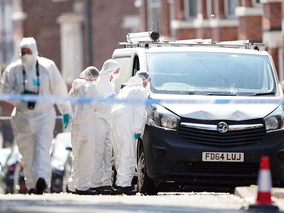 Police forensics officers on Ilkeston Road, Nottingham on Tuesday