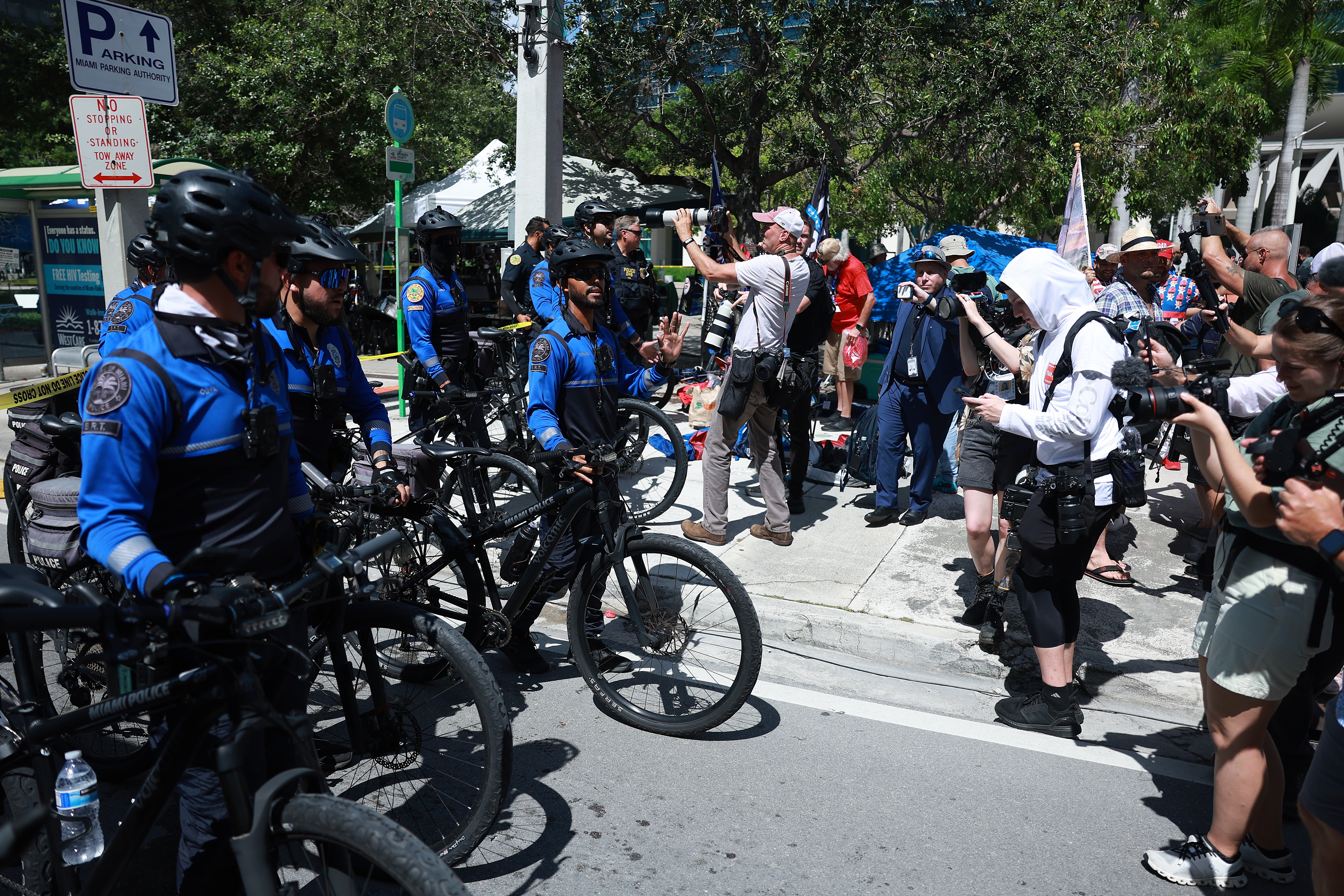 Miami Police on bicycles cordon off an area due to a suspicious device near the Wilkie D. Ferguson Jr. United States Federal Courthouse