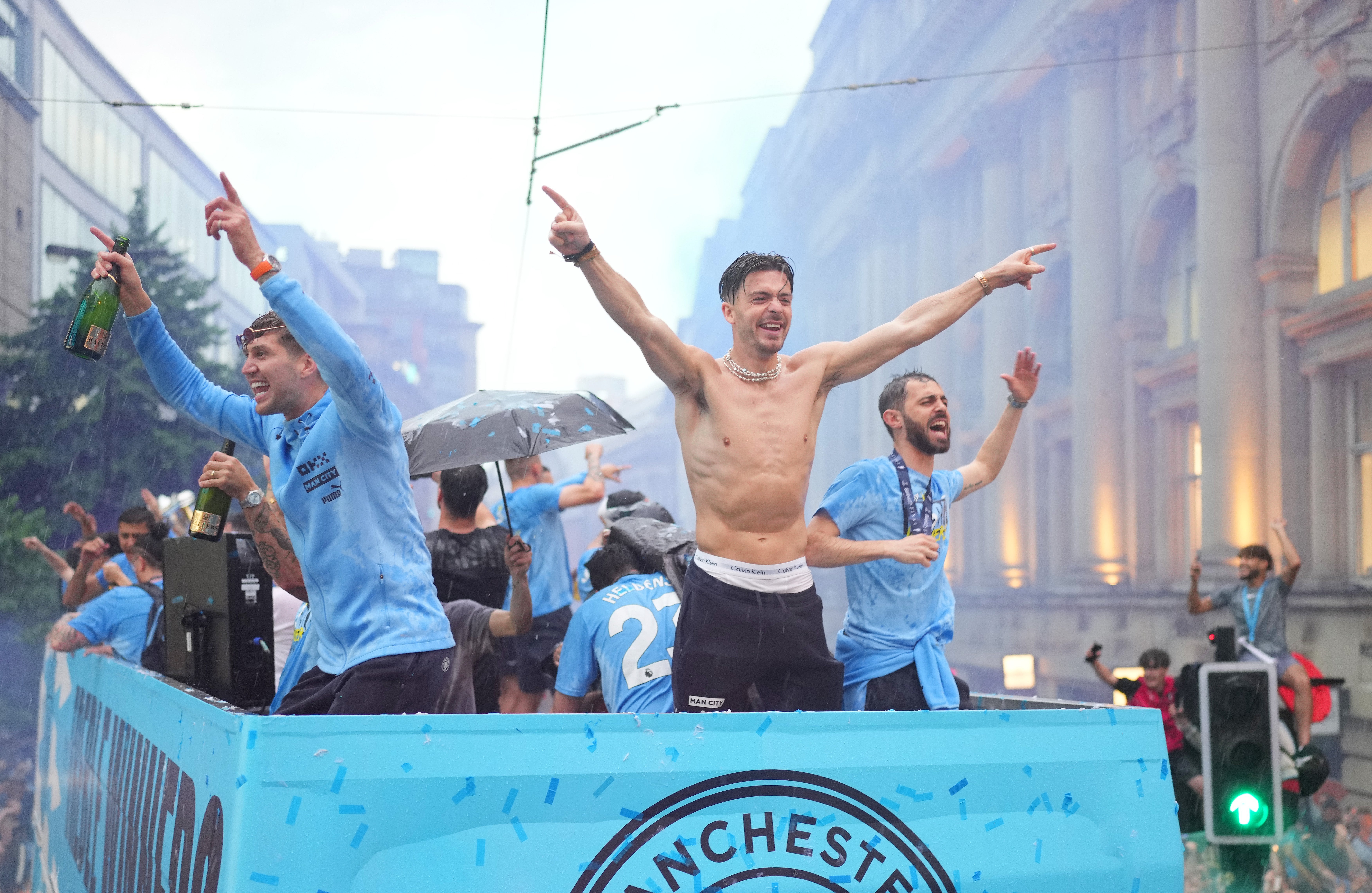 Manchester City celebrate after winning the treble