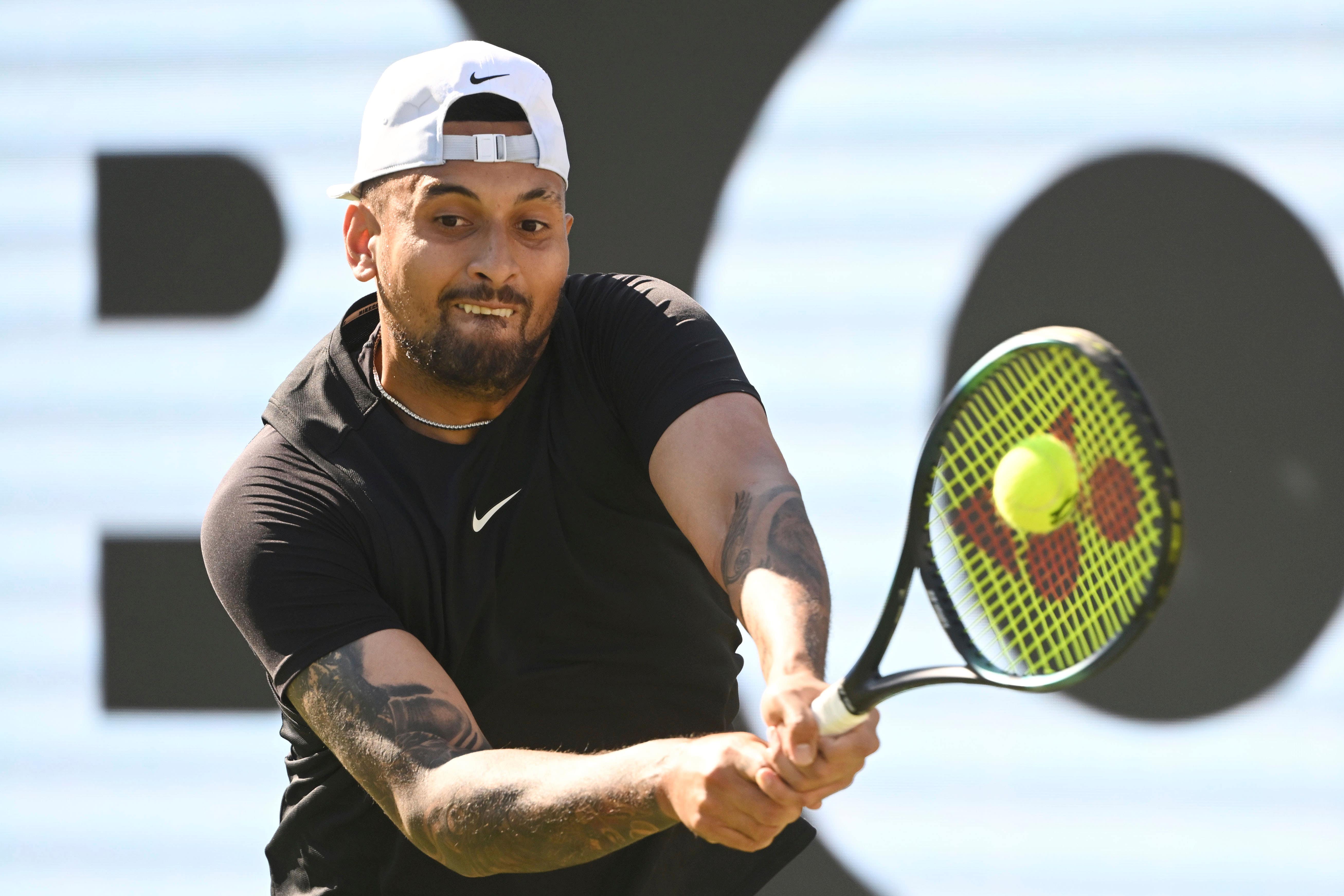 Australia’s Nick Kyrgios returns the ball to China’s Wu Yibing during the Stuttgart tennis tournament, Germany, Tuesday, June 13, 2023. (Marijan Murat/dpa via AP)