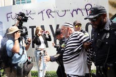 Clashes break out at Trump arraignment courthouse after ‘suspicious package’ sparks police response