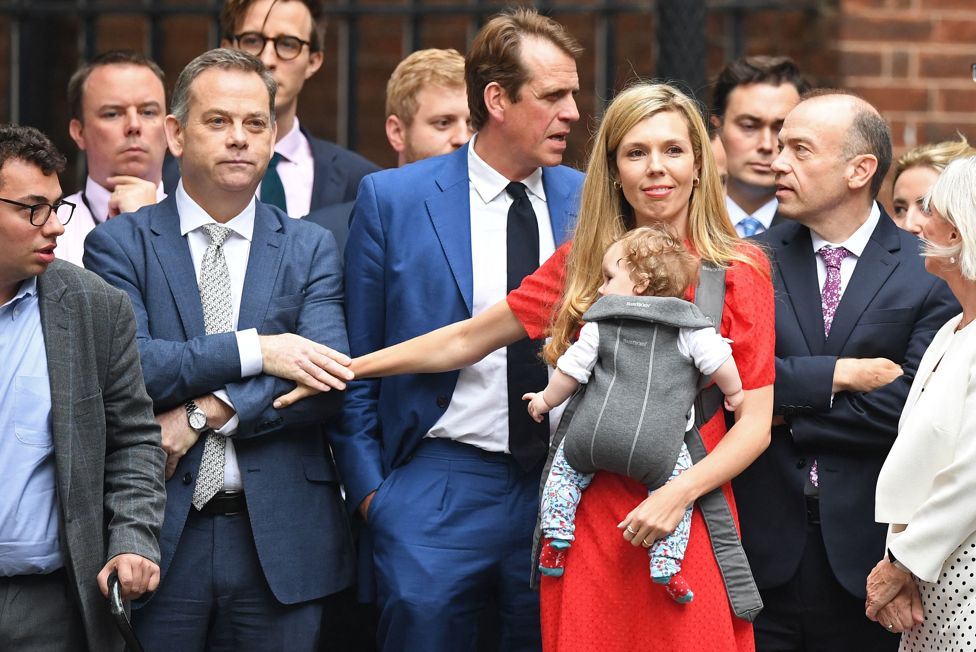 Carrie Johnson is comforted by Nigel Adams on the day Boris Johnson left Downing Street