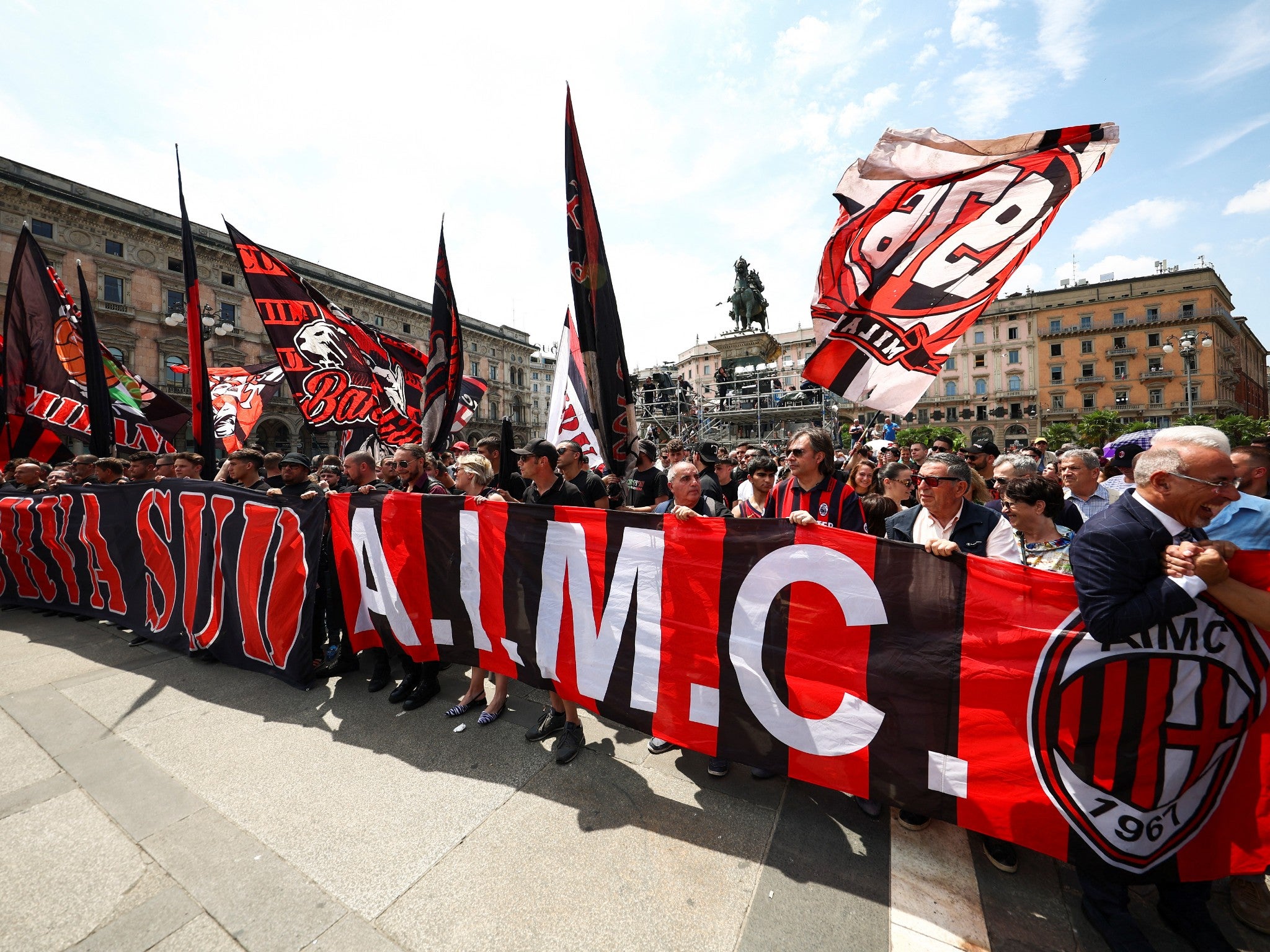 AC Milan supporters outside the funeral of Silvio Berlusconi