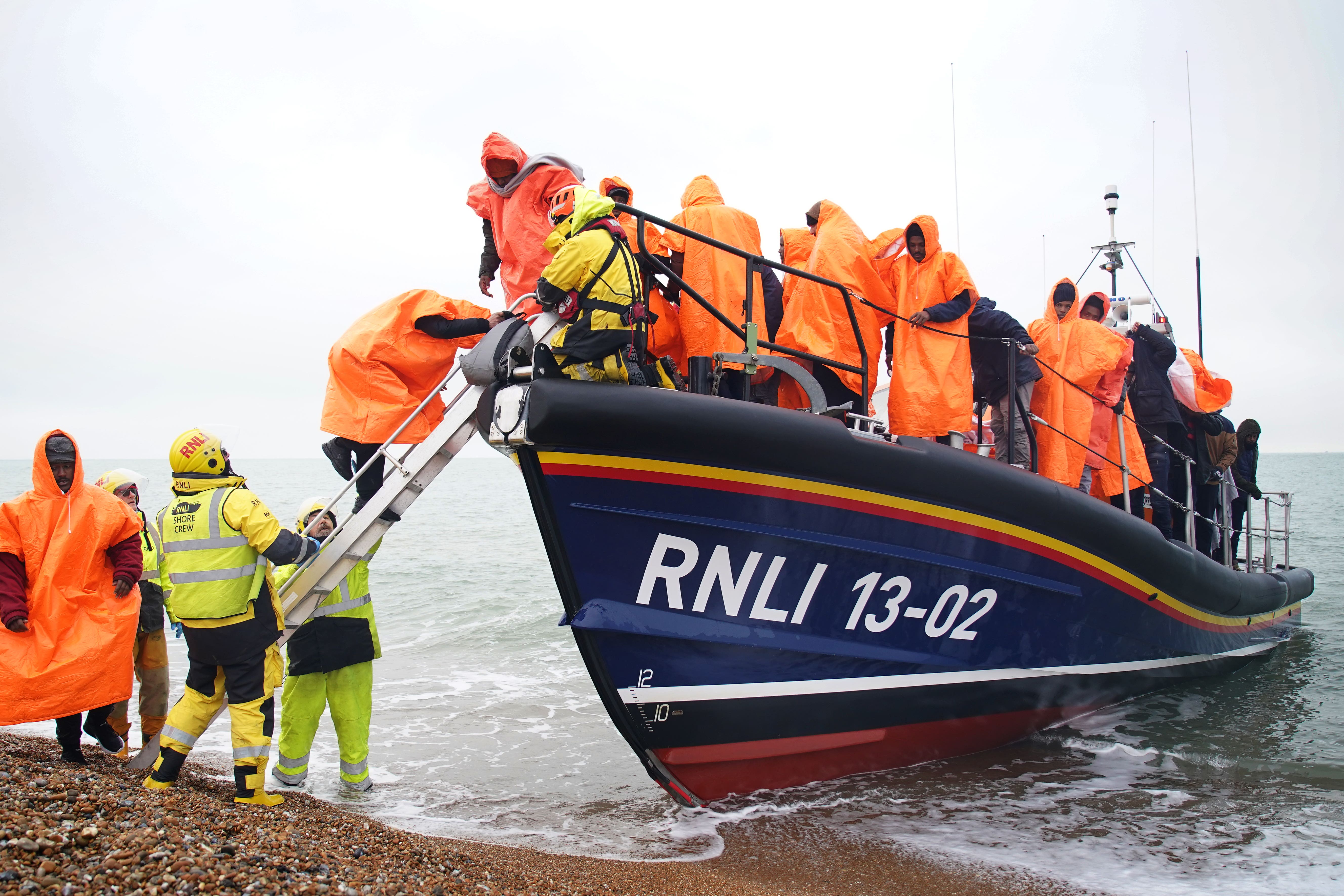 Ministers have been urged to tone down their harsh rhetoric about migrants crossing the channel (Gareth Fuller/PA)