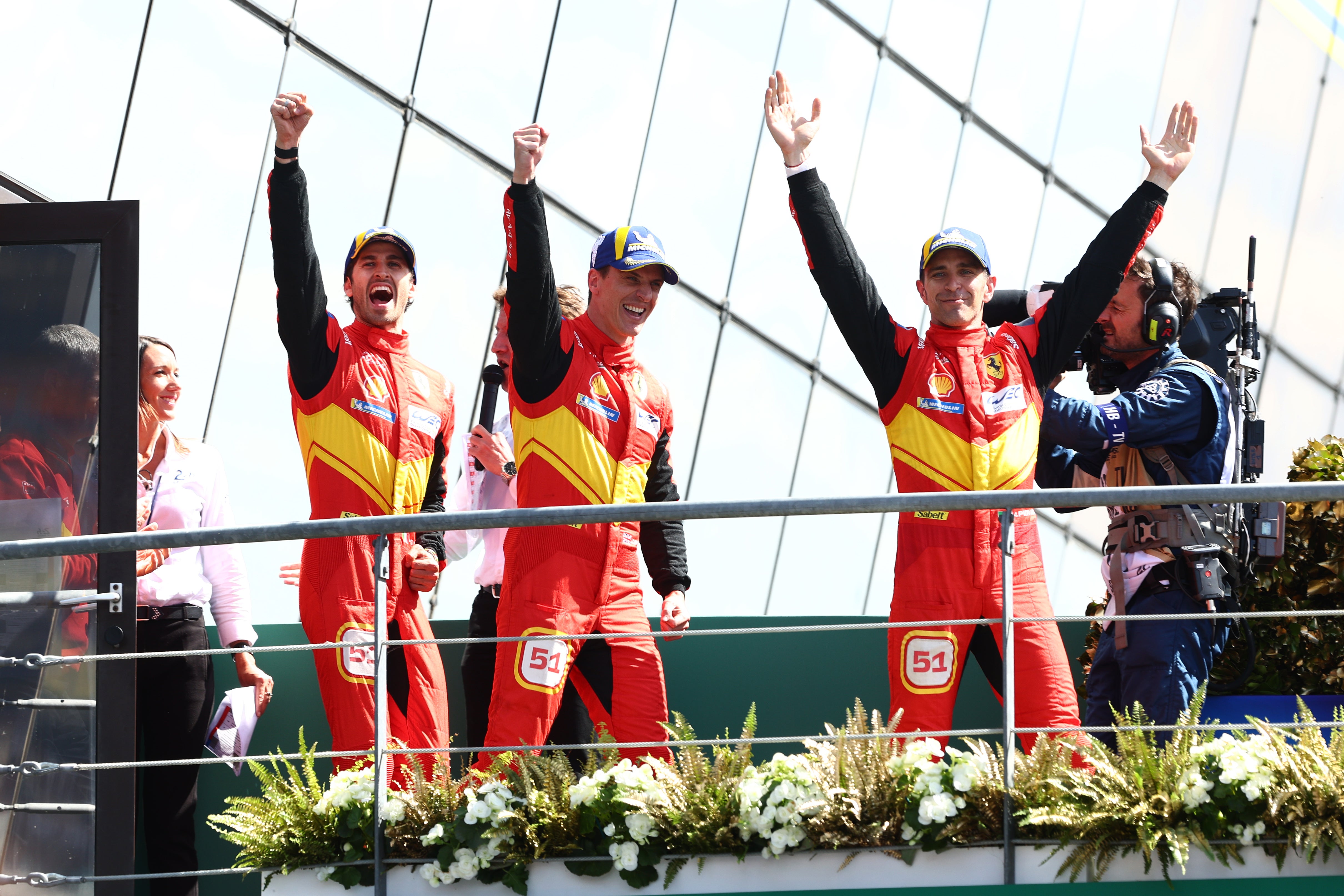 British driver James Calado (centre) was part of the Ferrari team which won the 24 Hours of Le Mans