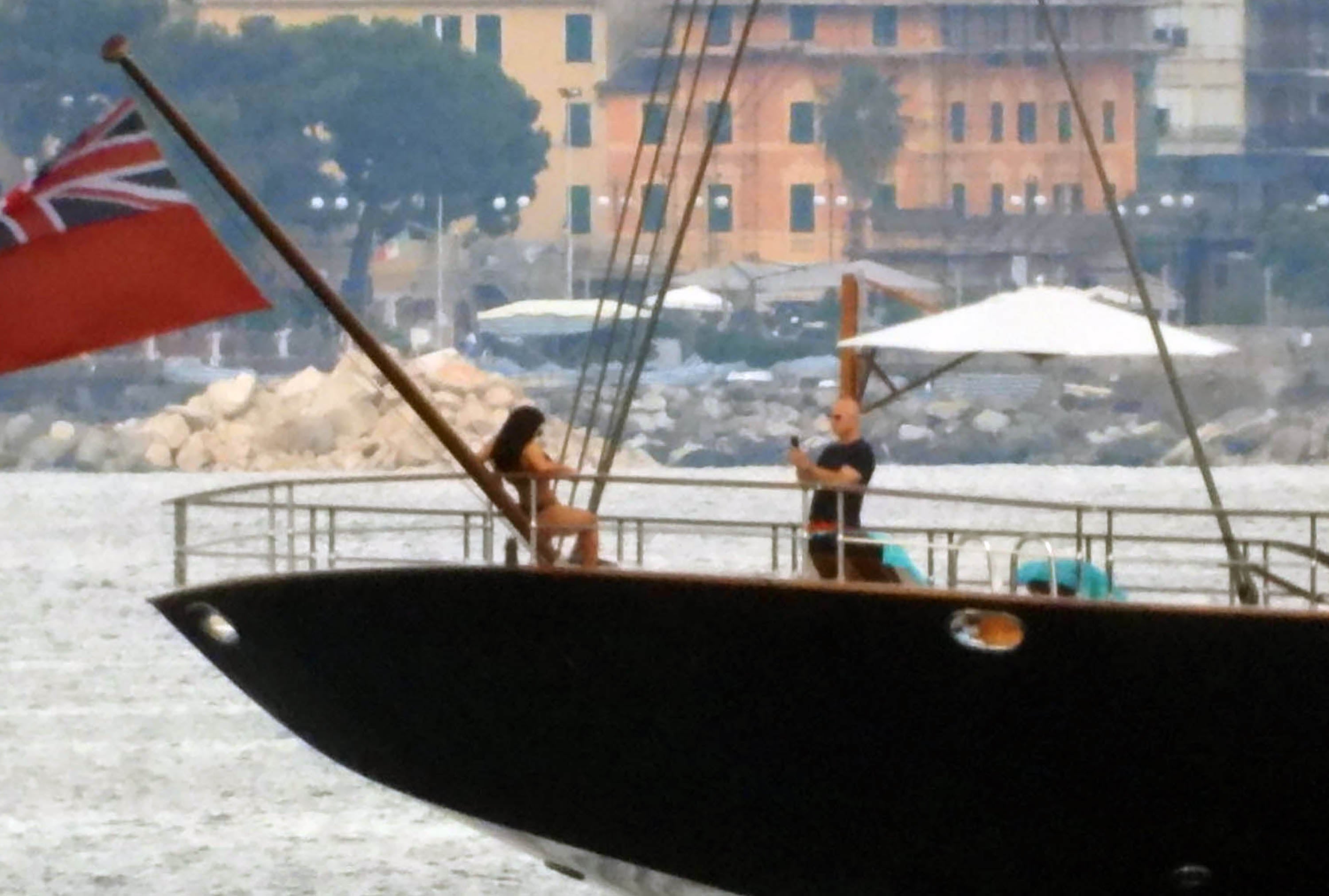 Jeff Bezos takes a photo of Lauren Sanchez on his yacht in Portofino, Italy