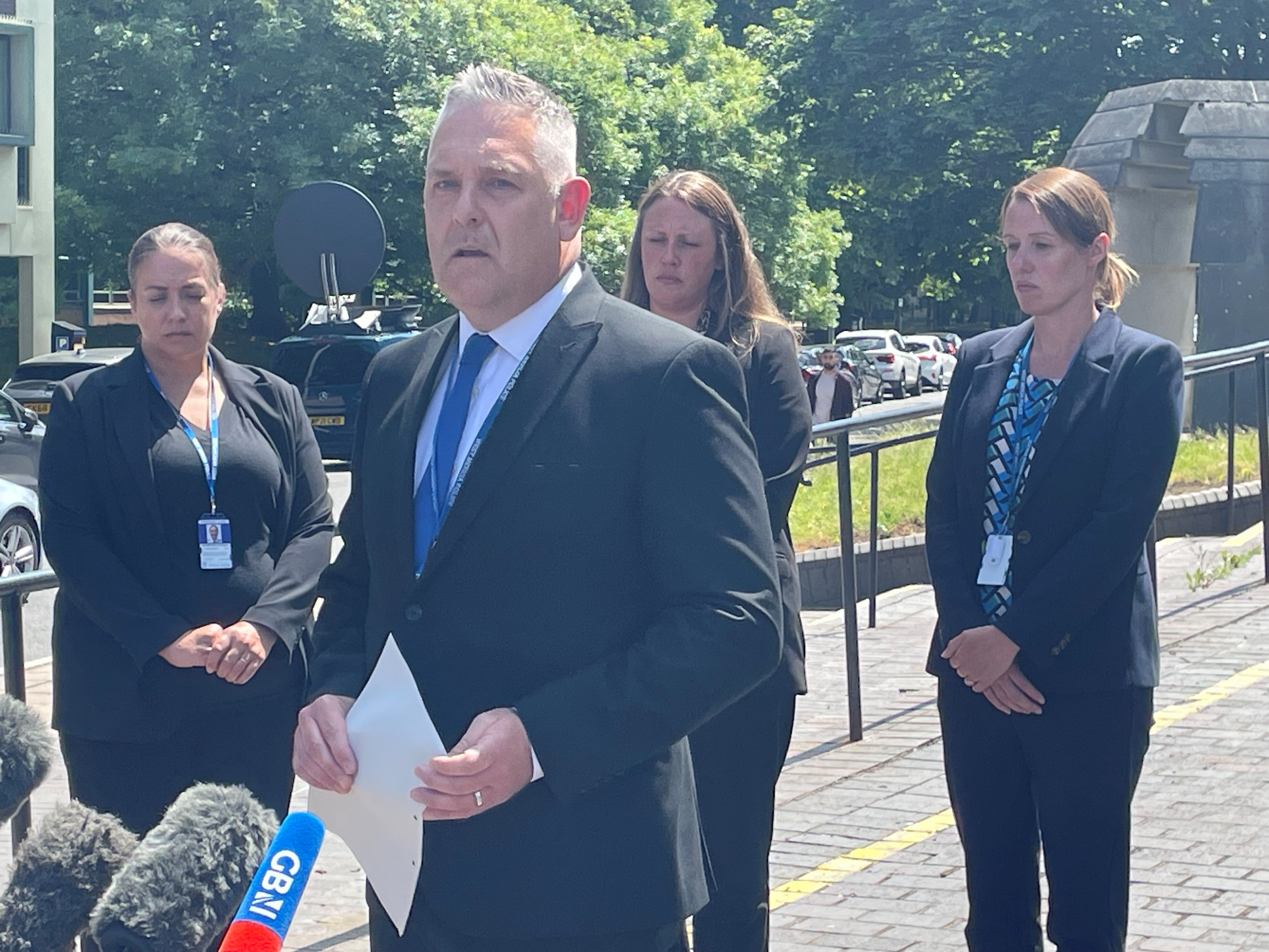 Detective Chief Inspector Leighton Harding, of West Mercia Police, reads a statement outside Coventry Crown Court