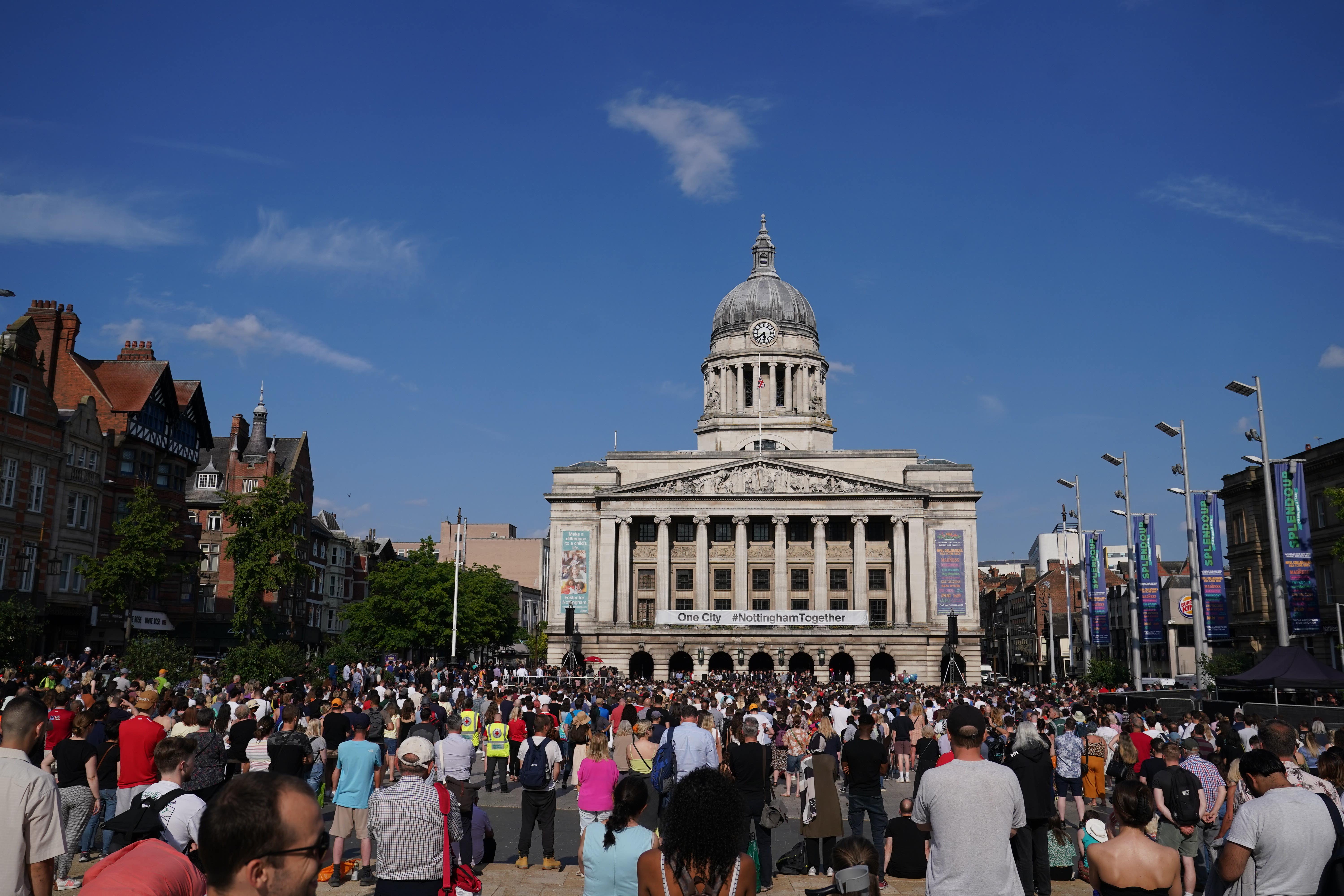 Members of the public at a vigil in Old Market Square, Nottingham (Tim Goode/PA)