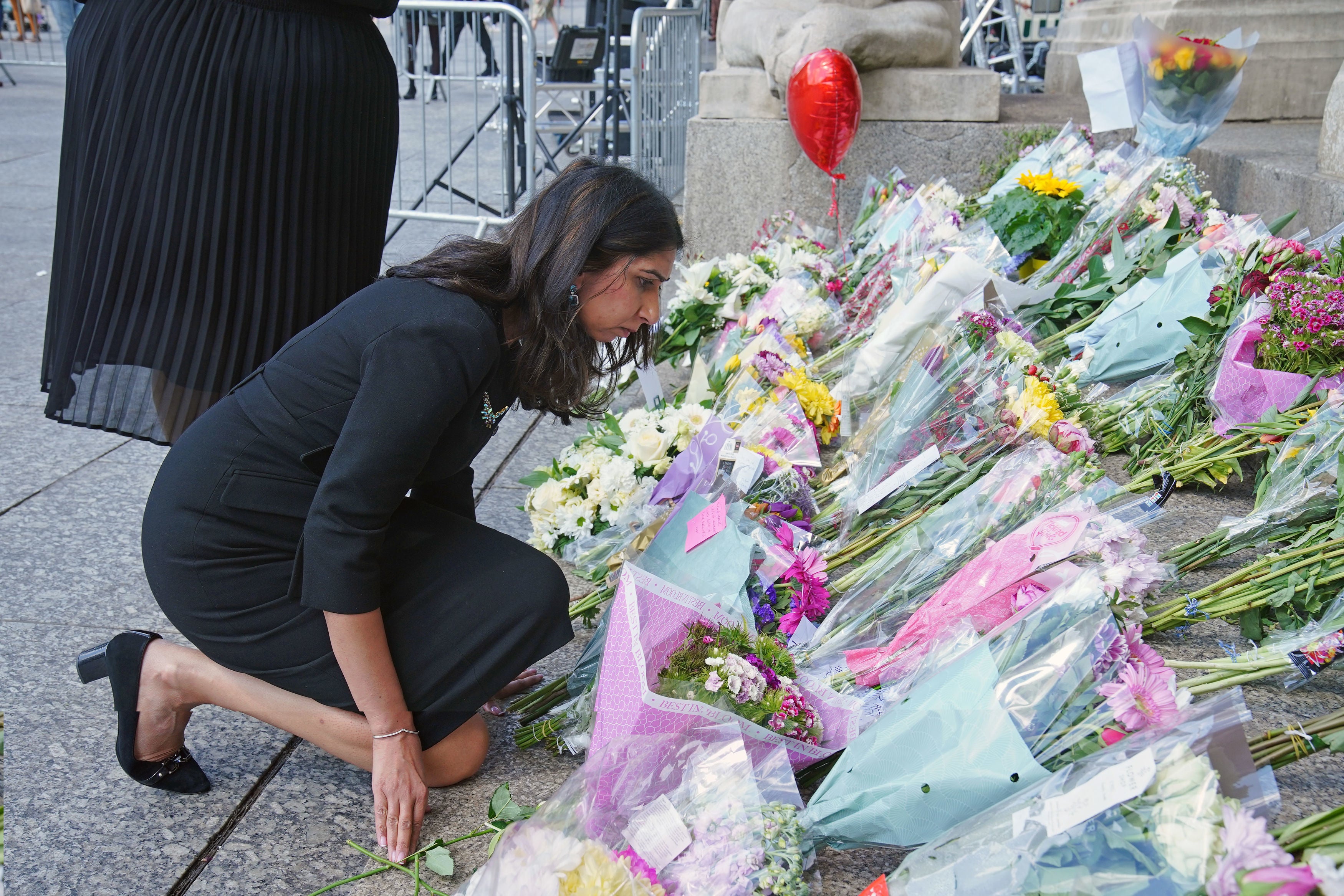 Home Secretary Suella Braverman visited Council House and read floral tributes to the victims