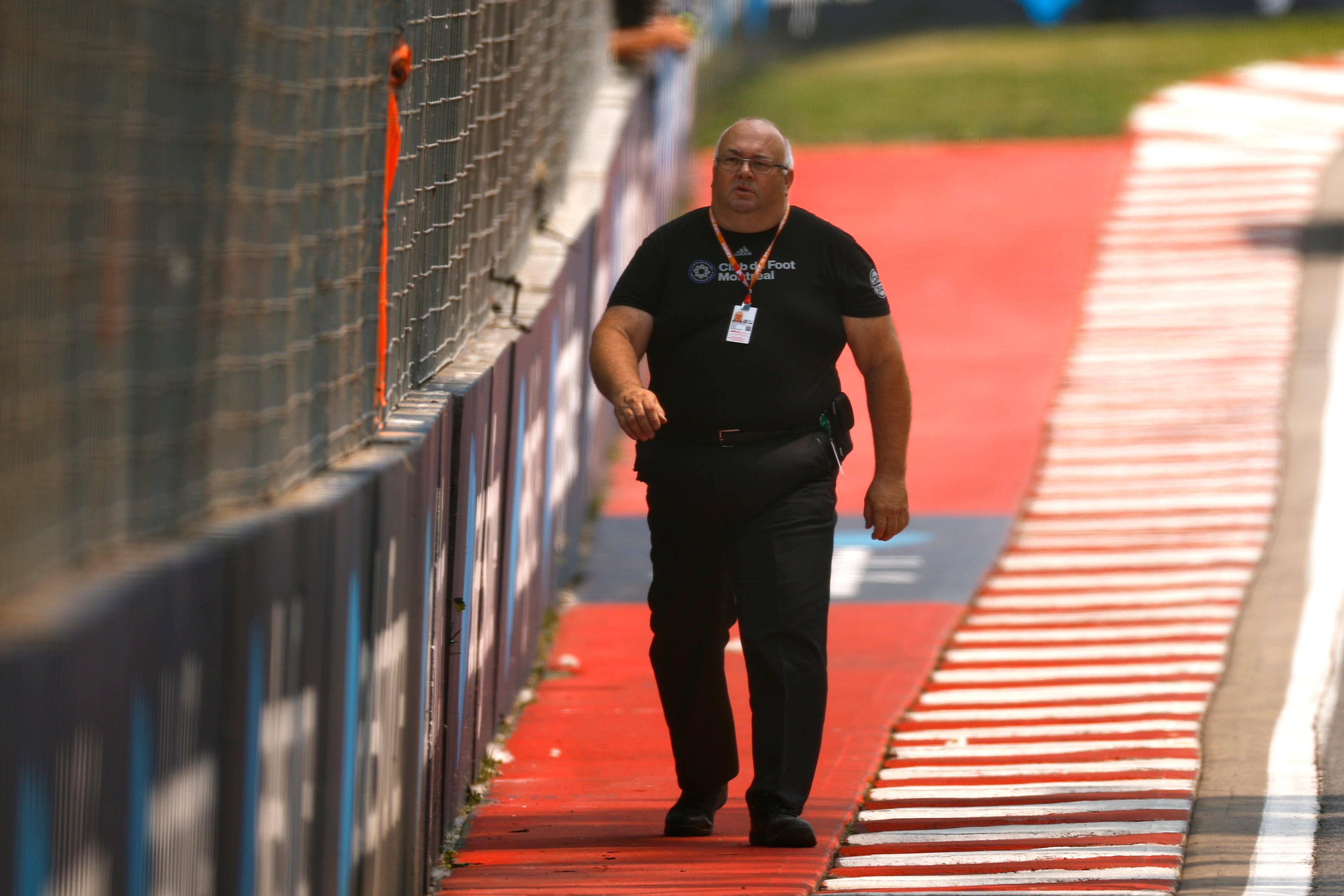 A track worker checks the CCTV system as practice was halted in Montreal