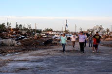 Texas town hit by tornado that killed three braced for more damage as high winds and hailstorms forecast