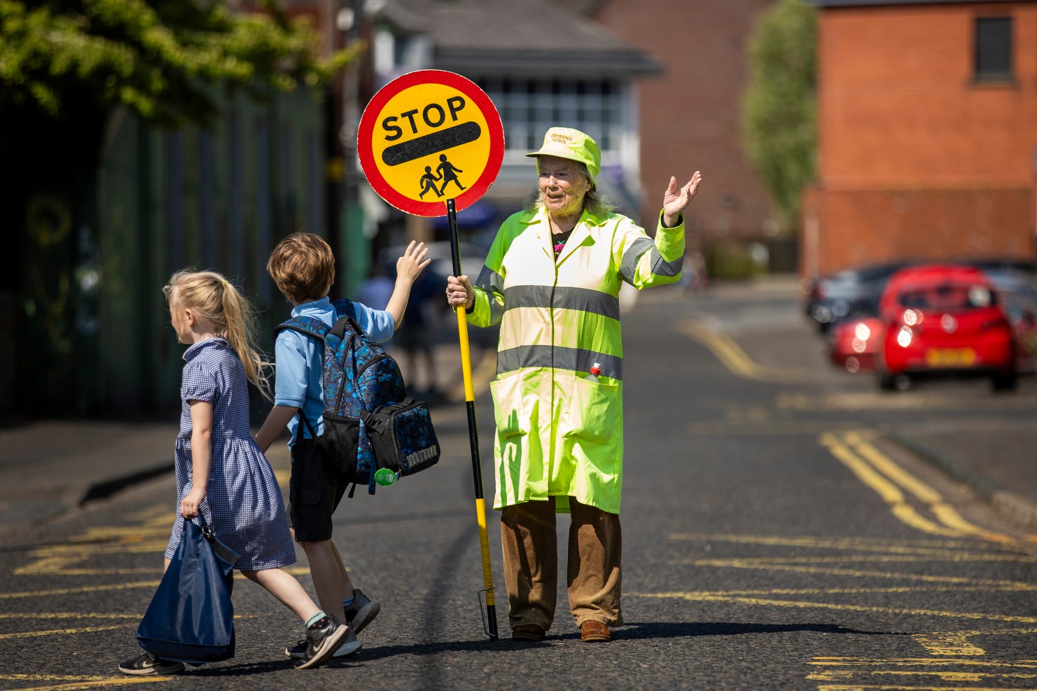 Lollipop lady Veronica Hammersley, 93, who works on the school crossing patrol at Glengormley Integrated Primary School in Northern Ireland, has been awarded the BEM (Liam McBurney/PA)