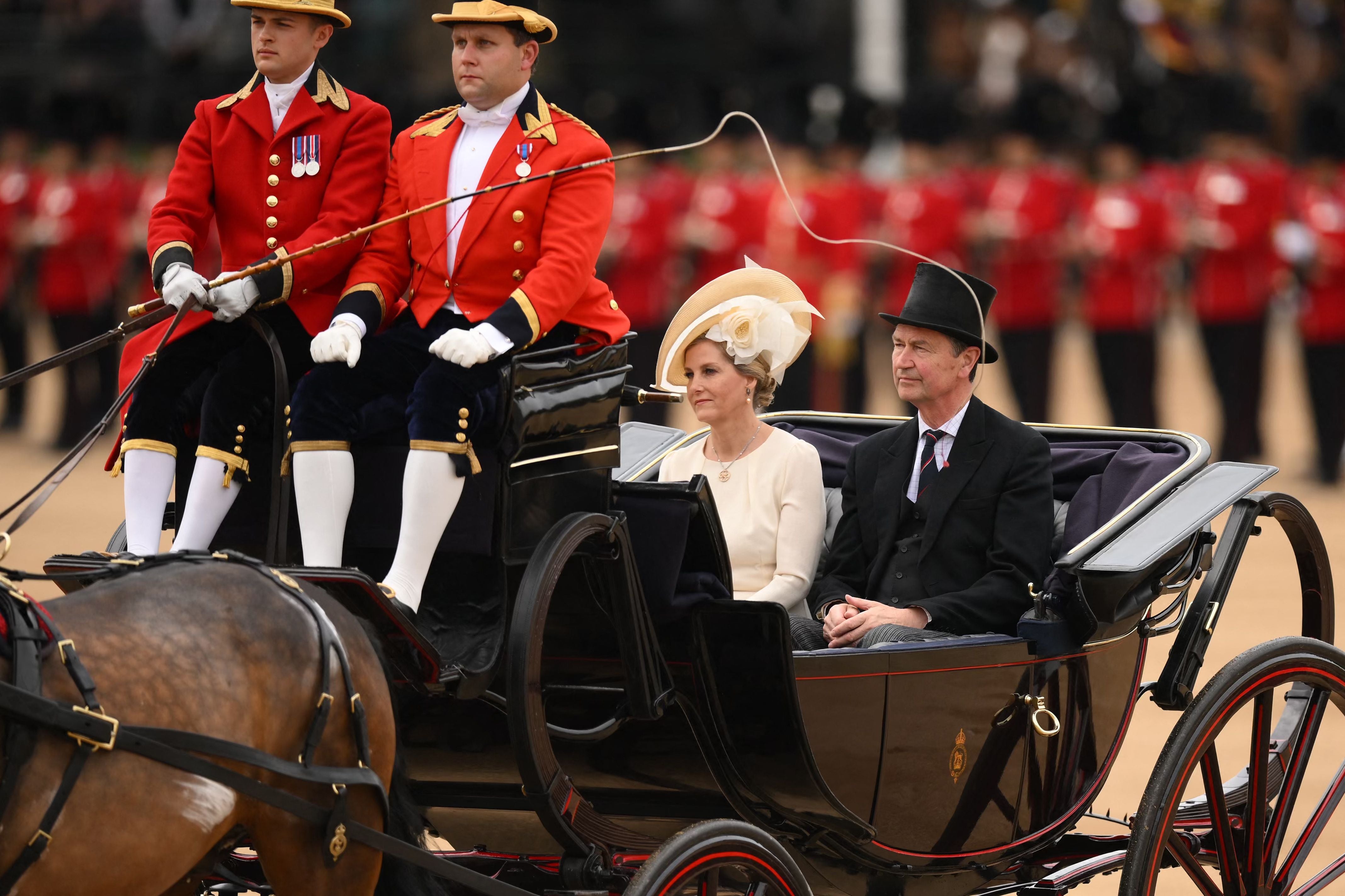 Sophie, Duchess of Edinburgh and Vice Admiral Timothy Laurence arrive in a horse-drawn carriage on Horse Guards Parade