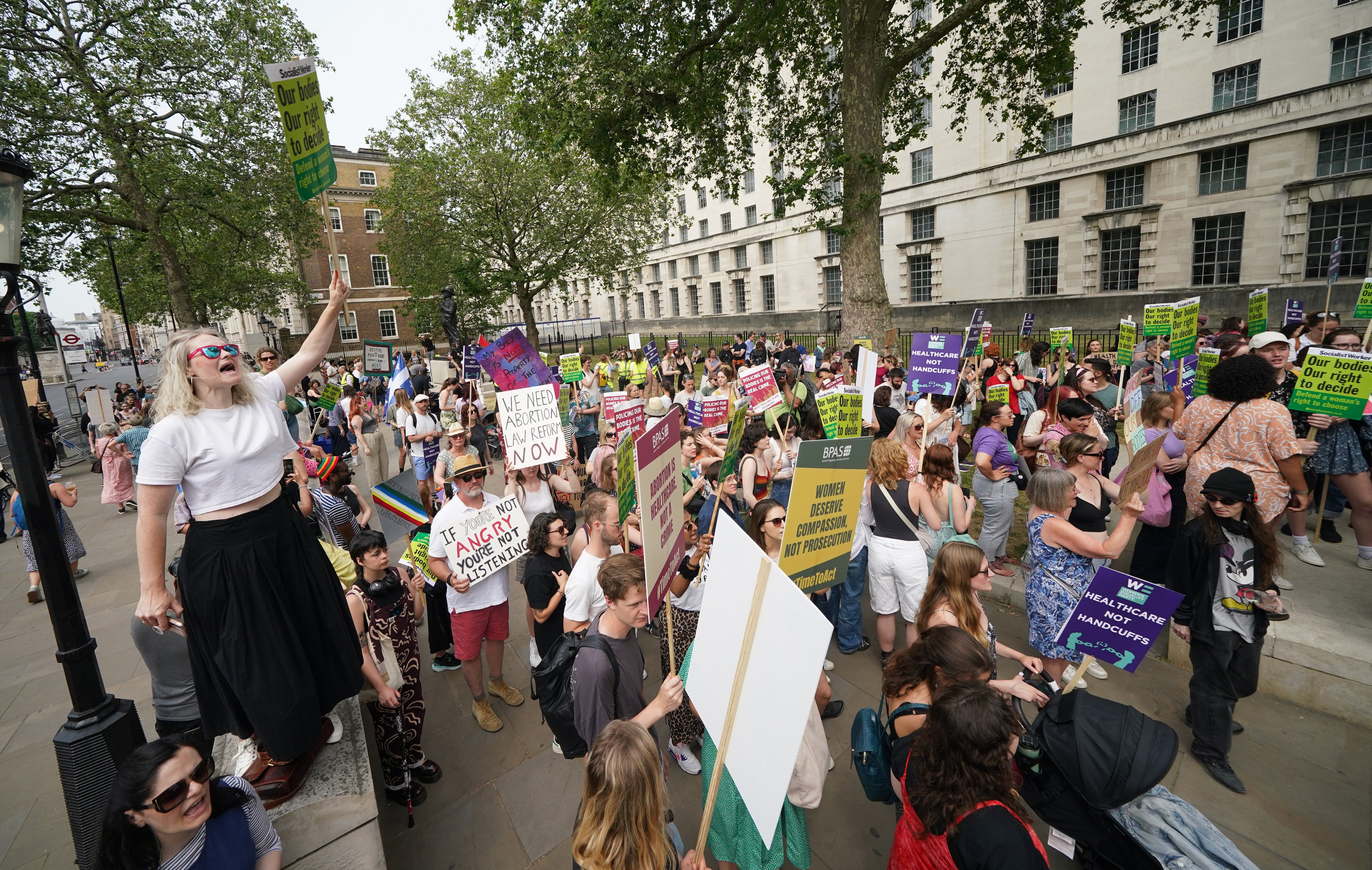 Protestors called for urgent reform to the 1861 legislation that states a woman attempting to end her own pregnancy outside a set of strict criteria can face up to life imprisonment