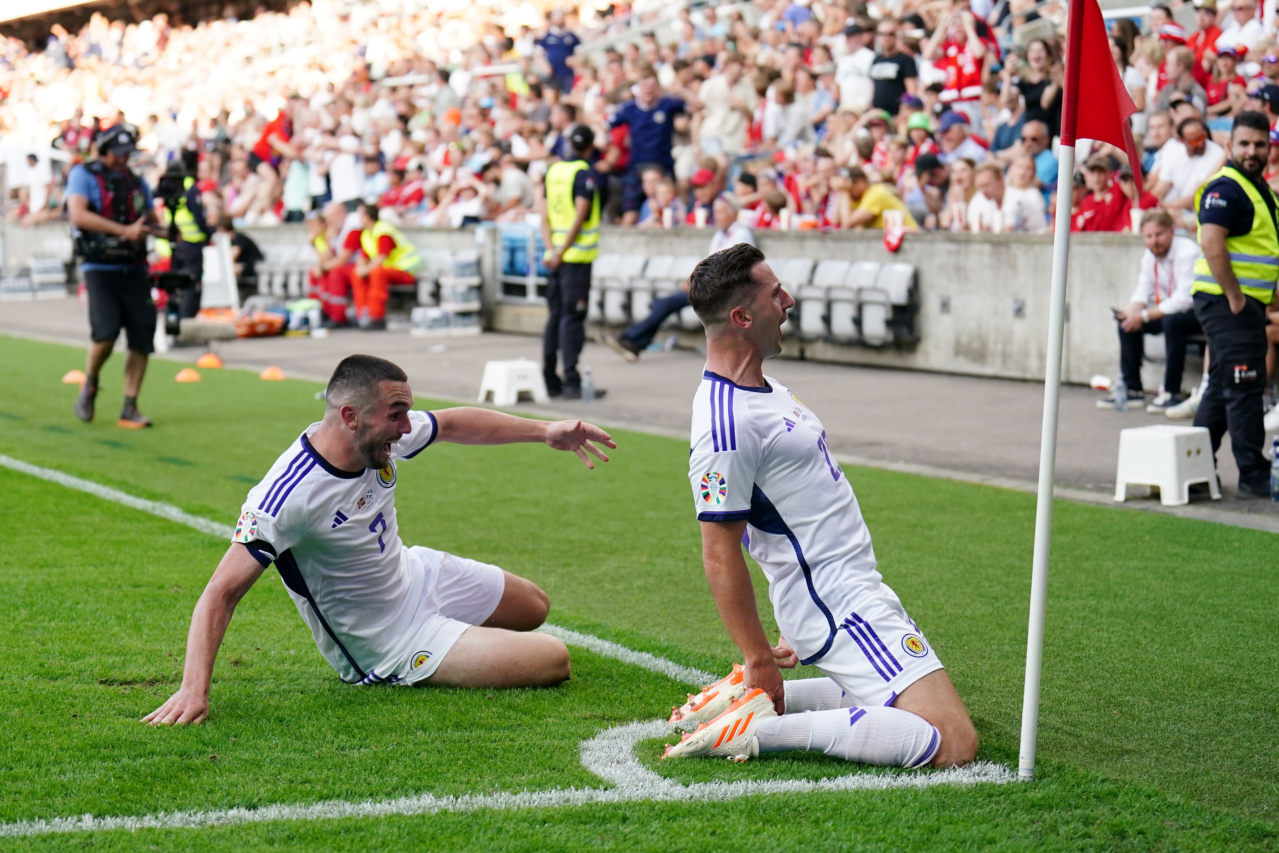 Scotland substitute Kenny McLean (right) celebrated his late winner with John McGinn (Zac Goodwin/PA)