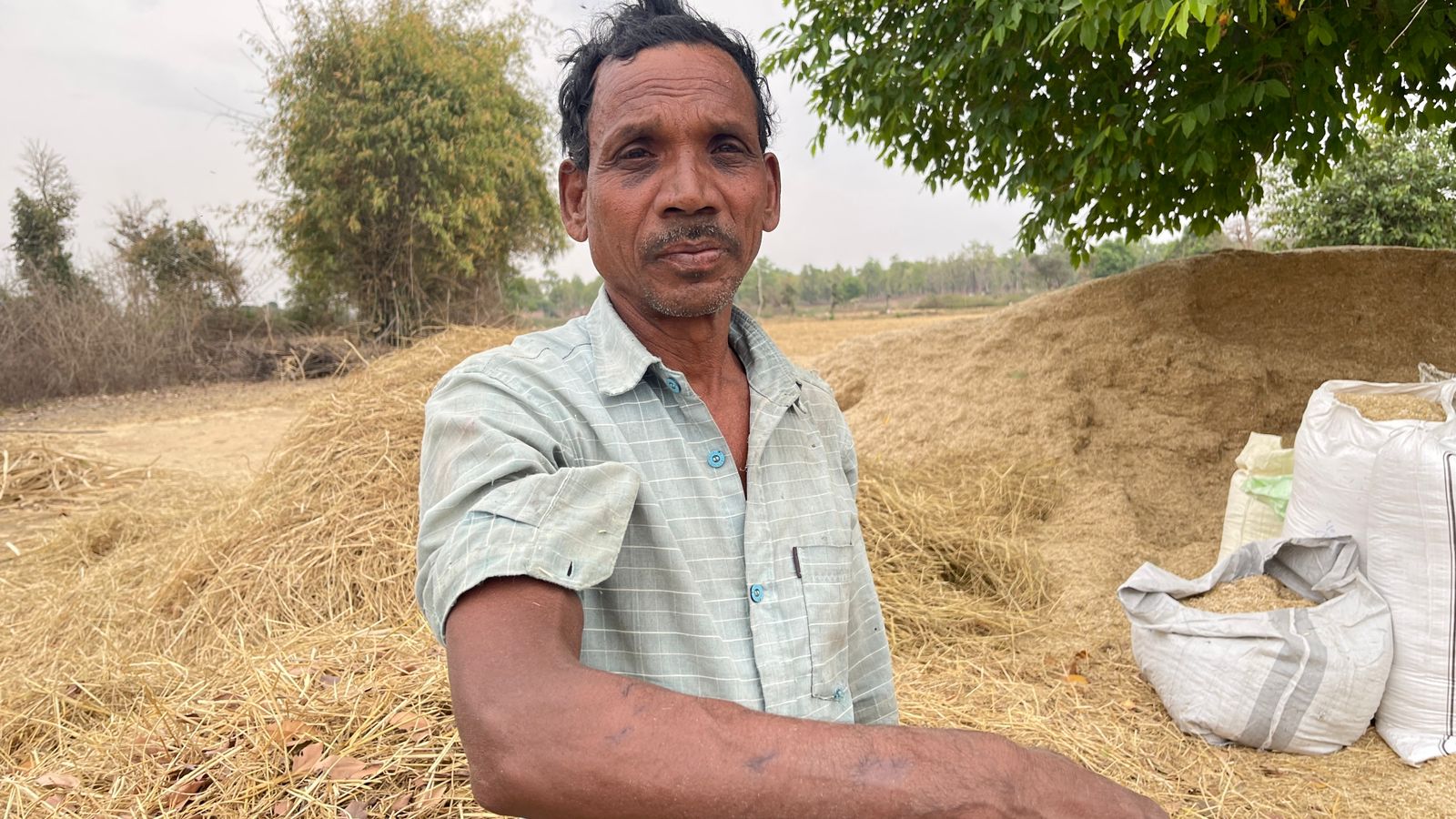 Cattle-herder Gudda shows stitched marks from his injuries after a dominant tiger in the area attacked him