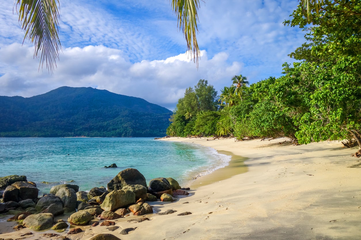 Crystalline waters wash up onto Sunset Beach