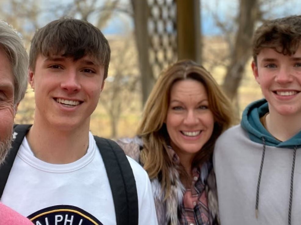 Barnaby Webber with his father David, mother Emma and younger brother Charlie