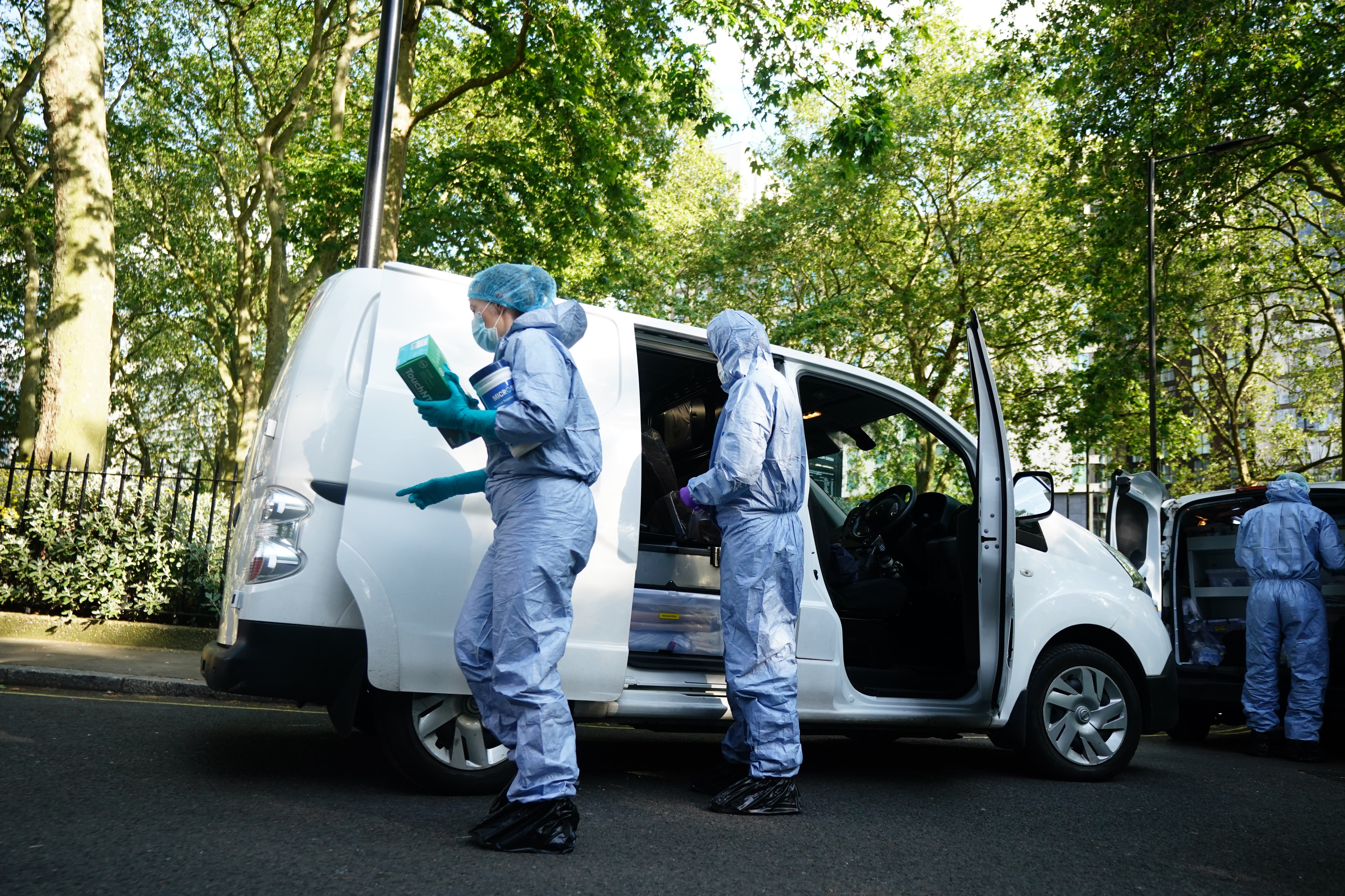 Police forensics officers at the scene in Paddington Green in London