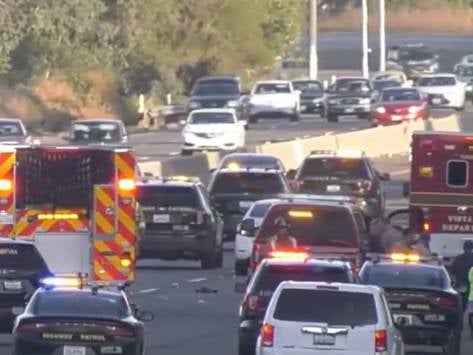 First responders are pictured at the scene where the children were killed