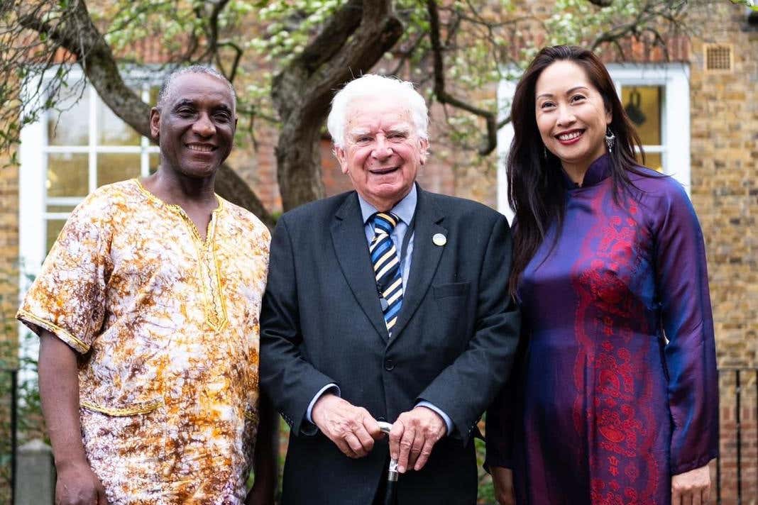 Lord Roberts of Llandudno with Citizens of the World Choir (Aref Hussaini/PA)