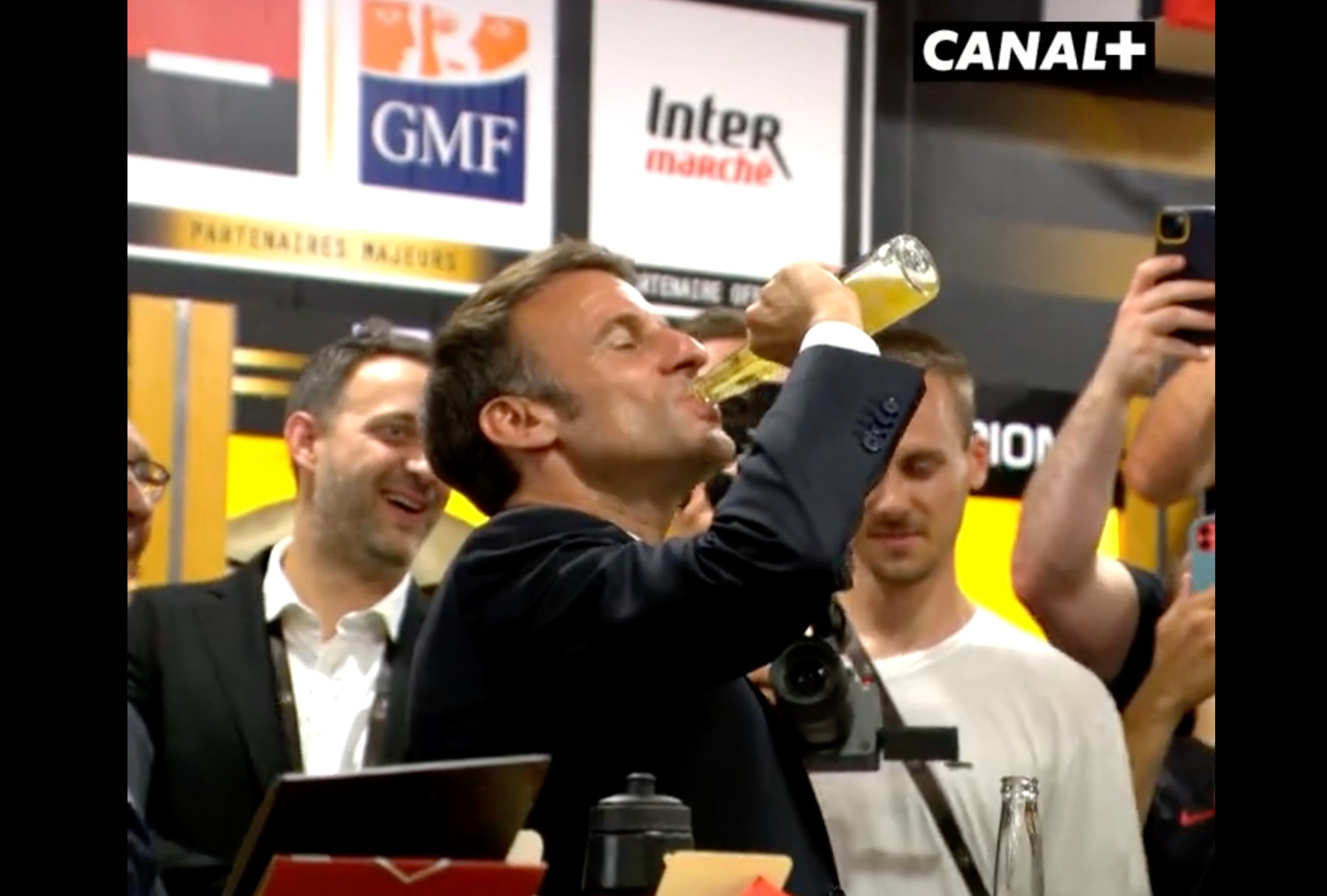 Bottle job: Macron downs a beer in 17 seconds in June at the French Top 14 rugby final in June