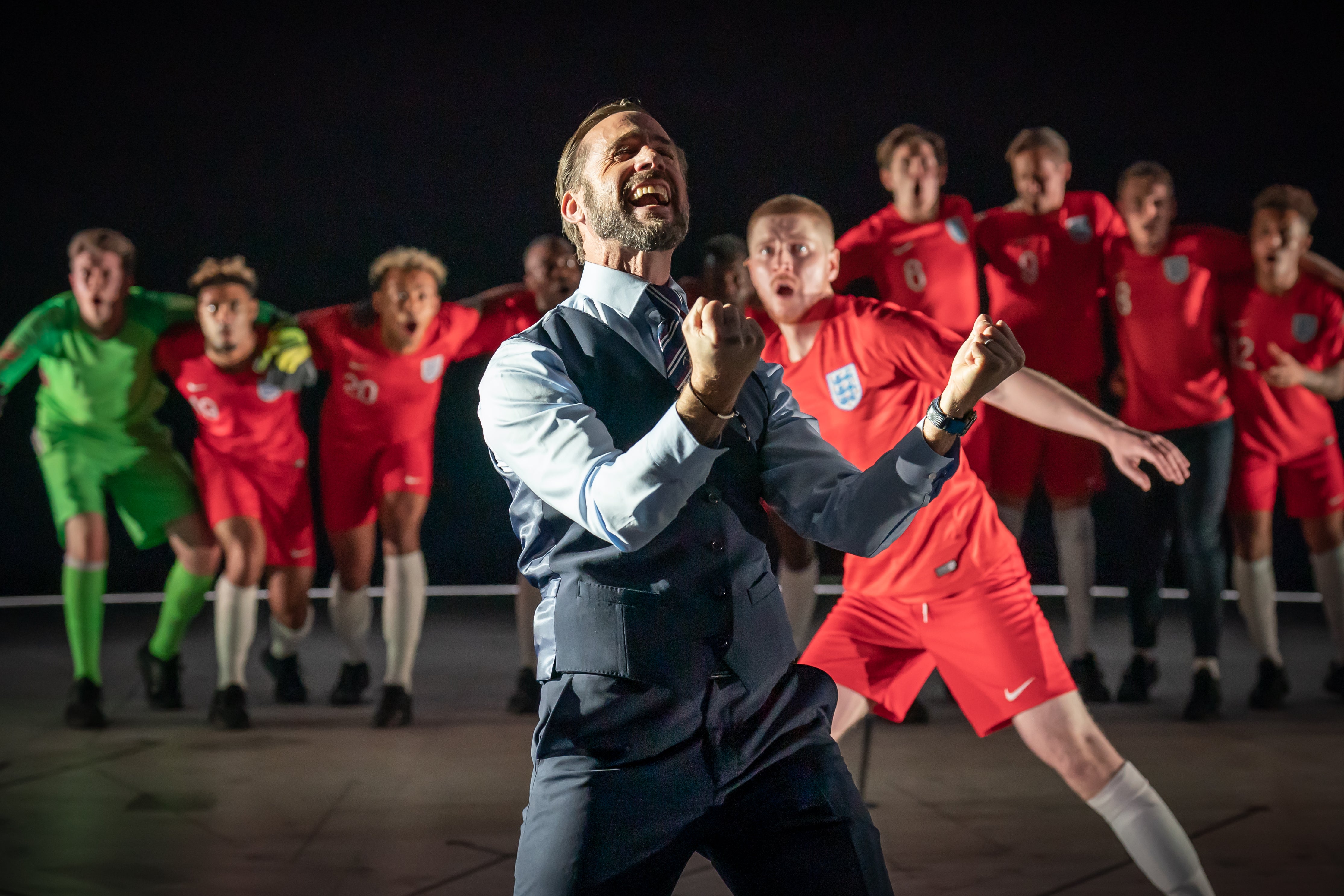 Joseph Fiennes (foreground) and the cast of ‘Dear England'