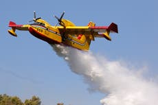 New firefighting planes sought across the warming planet are on their way, with a little delay