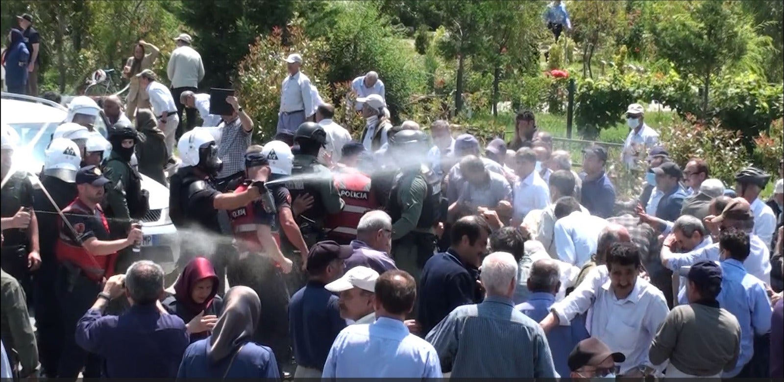 Police in Albania deploy chemical sprays against a large crowd of unarmed members of the MEK at Ashraf III