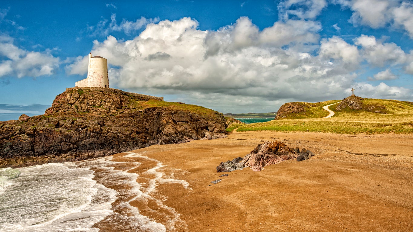 Ynys Llanddwyn is a small tidal island at one end of Newborough Beach